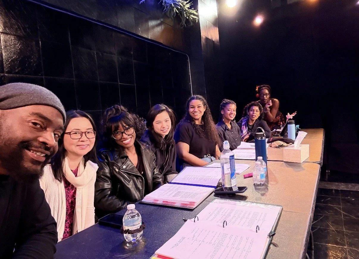 Behind-the-scenes moment from a live theater performance at The Tank Theater with actors on stage.