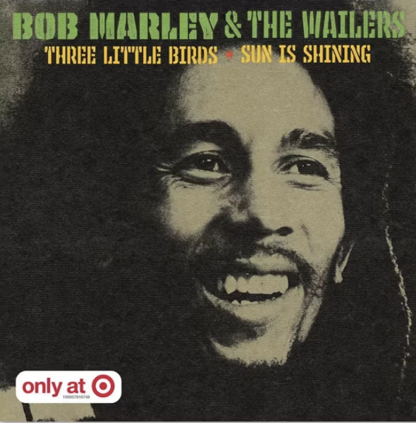 Album cover of Bob Marley & The Wailers titled "Three Little Birds" with a smiling portrait of Bob Marley, green and yellow text, and an Only At Target logo.