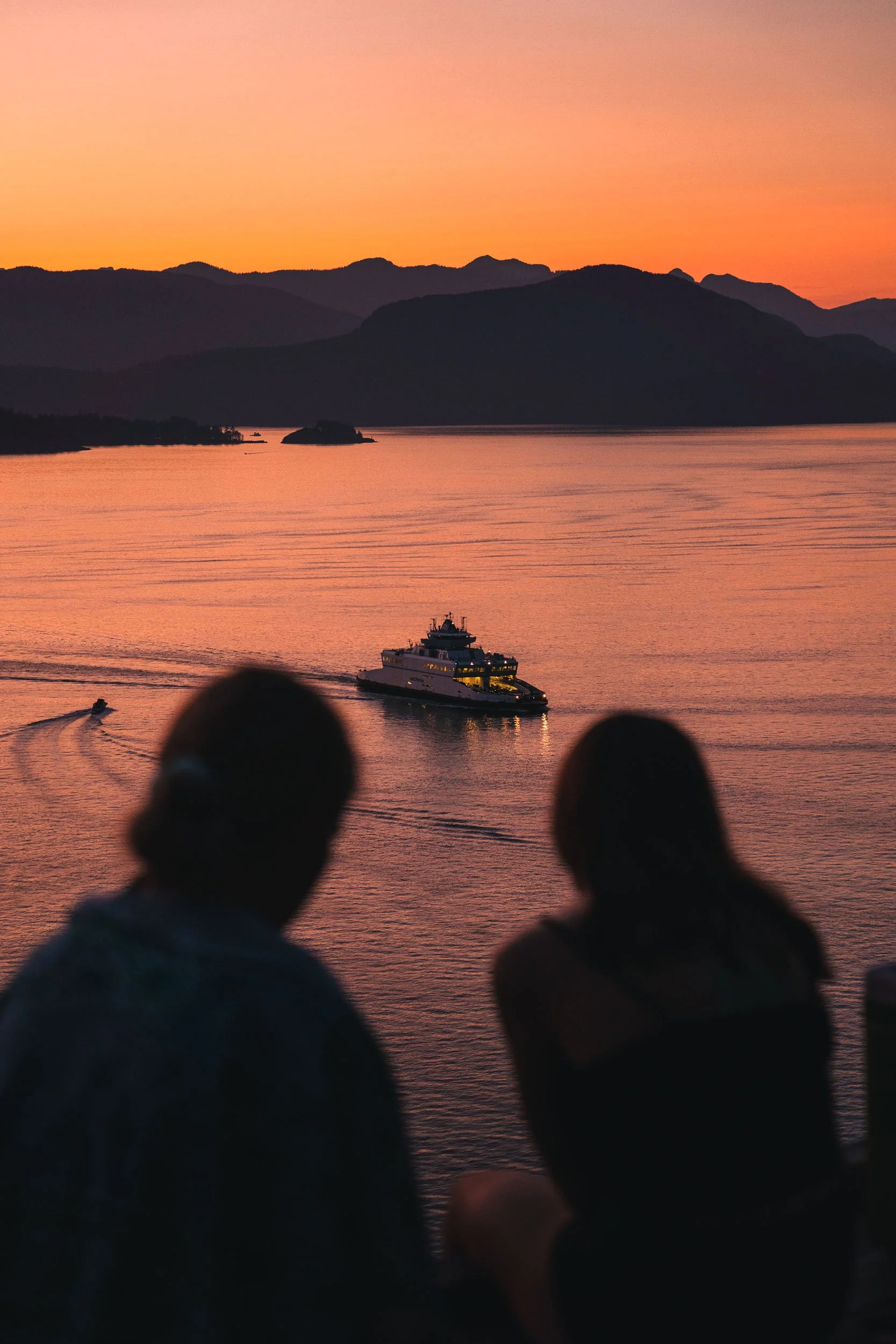 Silhouetted Ladies Watching Sunset Ferry Vancouver.jpg