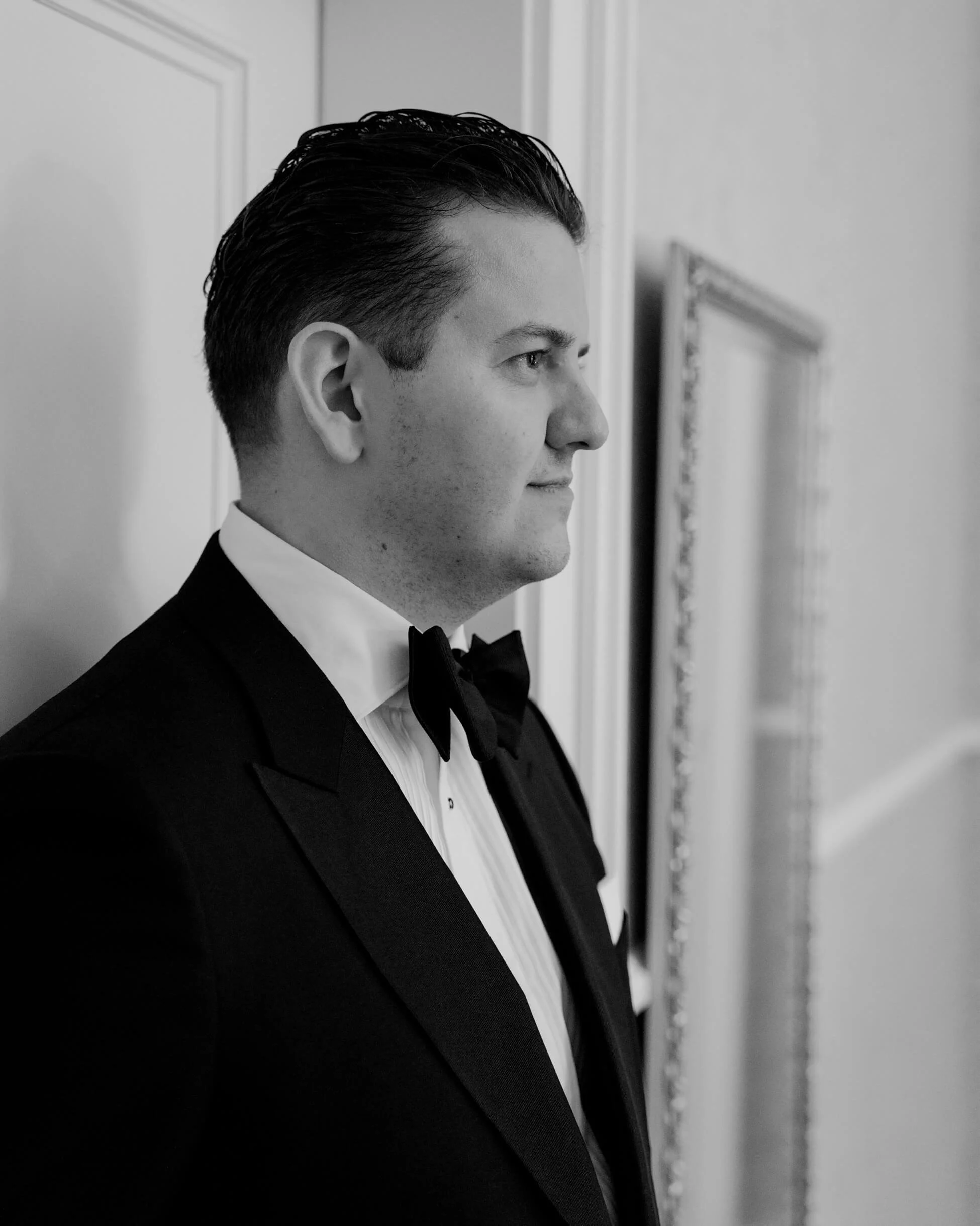 Best man is looking at the groom
