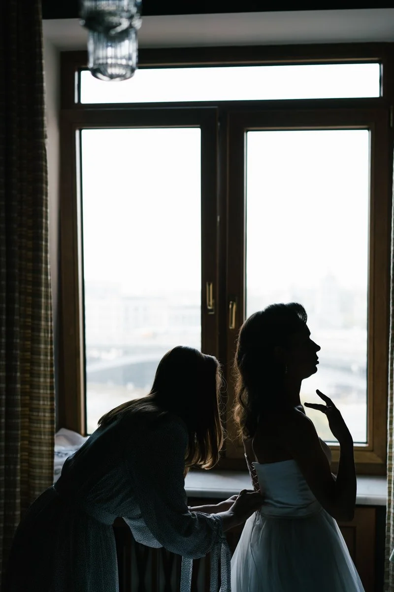Munich wedding photographer. Wedding preparation during the morning with bride and her bridesmaid