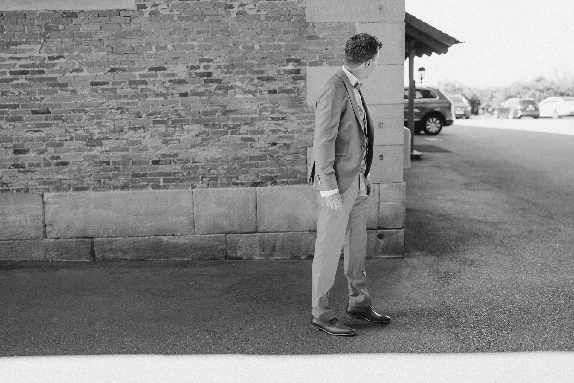 Groom is looking for his bride before the first look on a wedding day