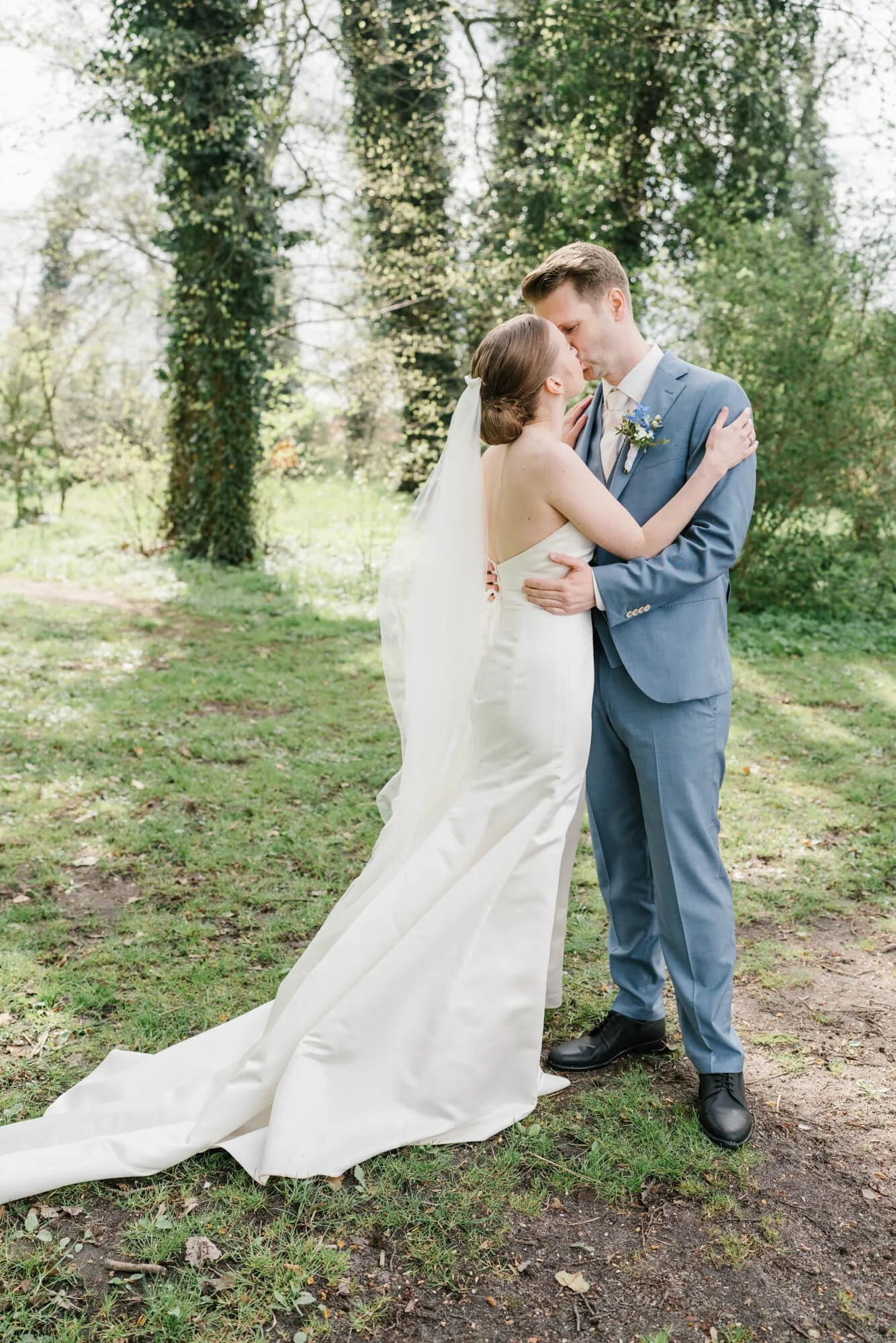 bride is kissing gentle her husband