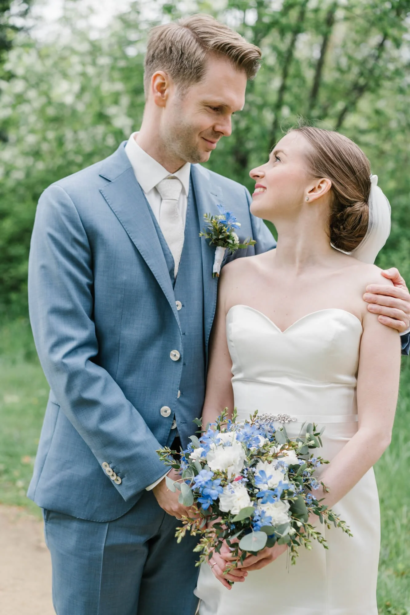 bride and groom looking to each other