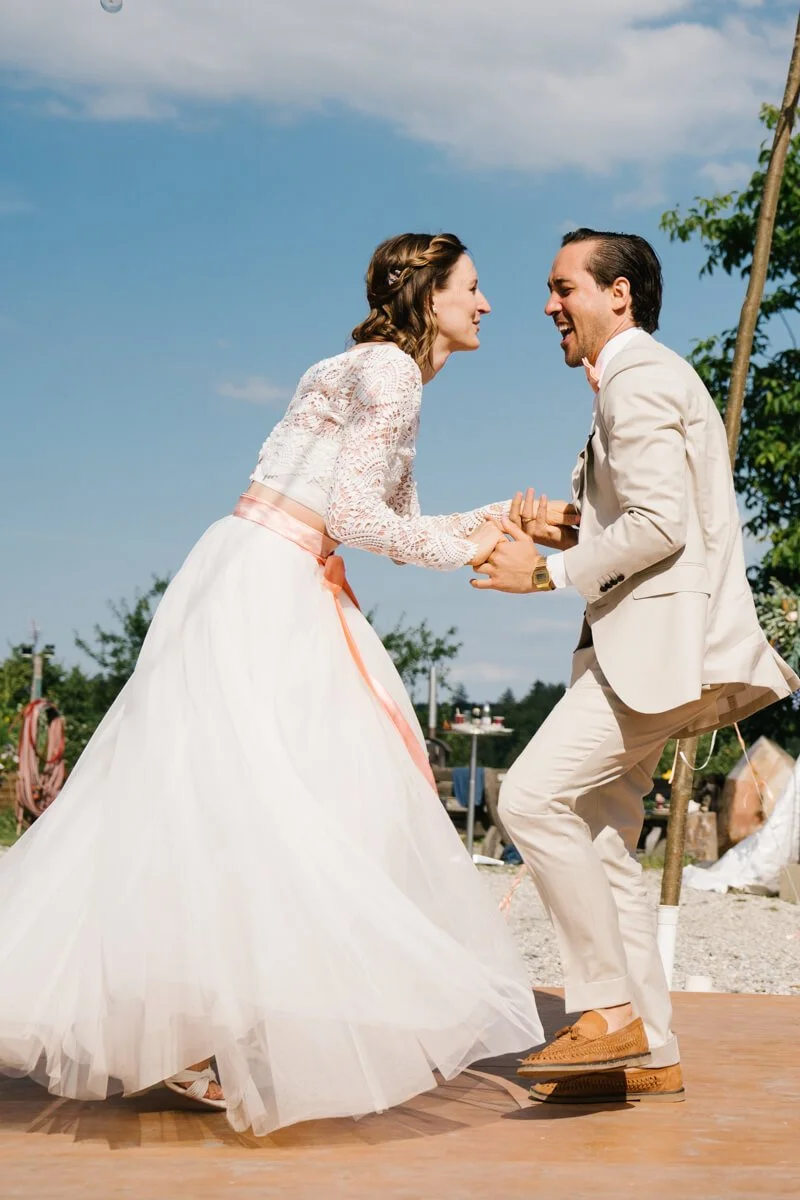 Wedding couple is dancing during their wedding celebration in wedding venue Seminarhof Lamplstätt in Munich