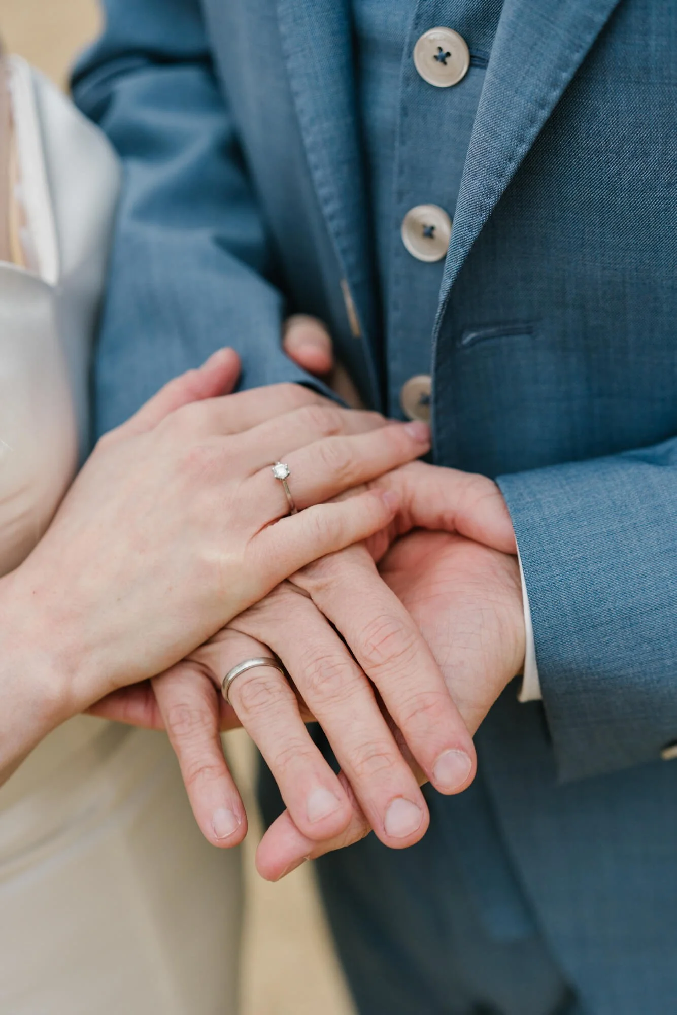 hands with wedding rings, close up photo