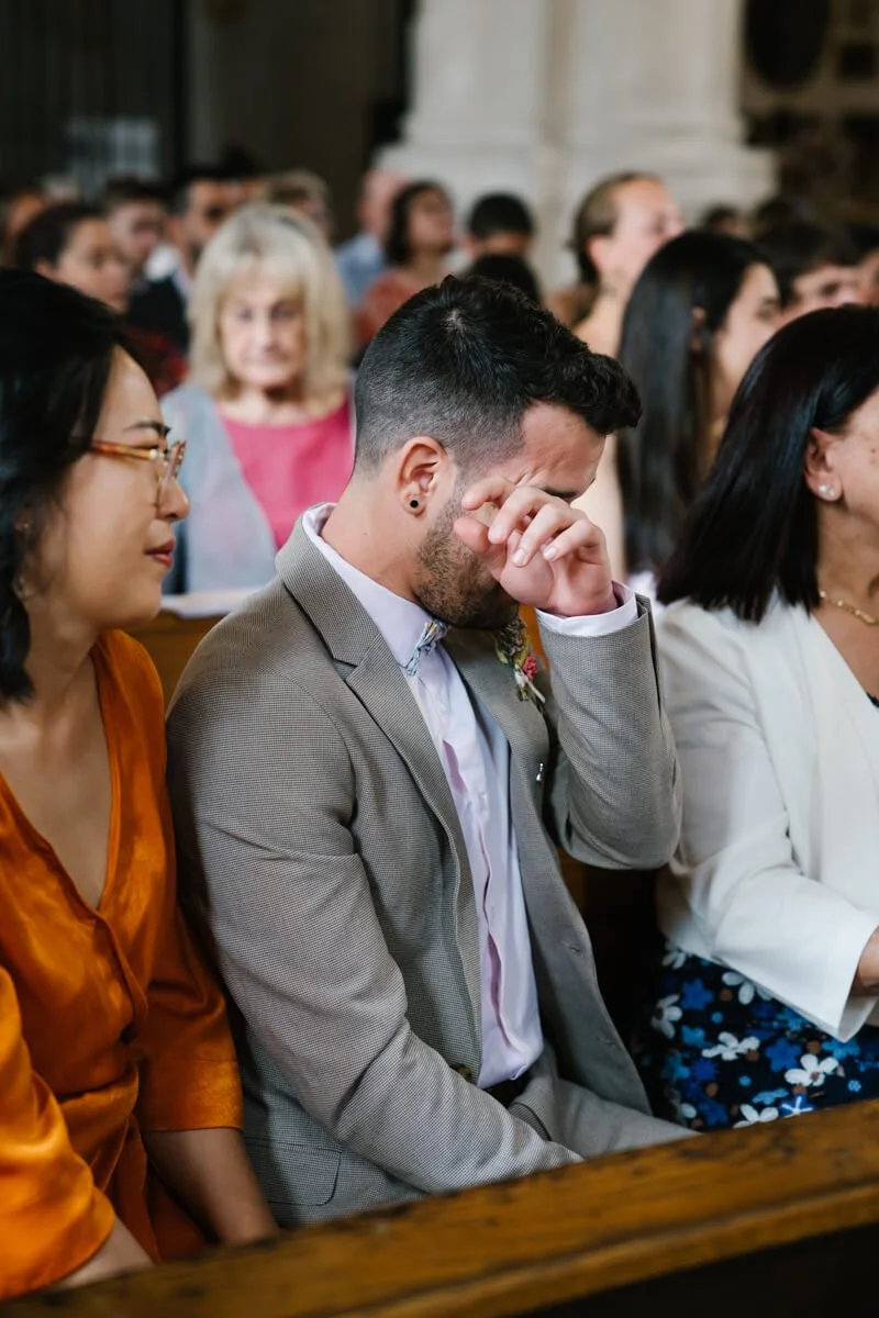 Guests is crying in church during an emotional speech on a wedding day in a church in Munich