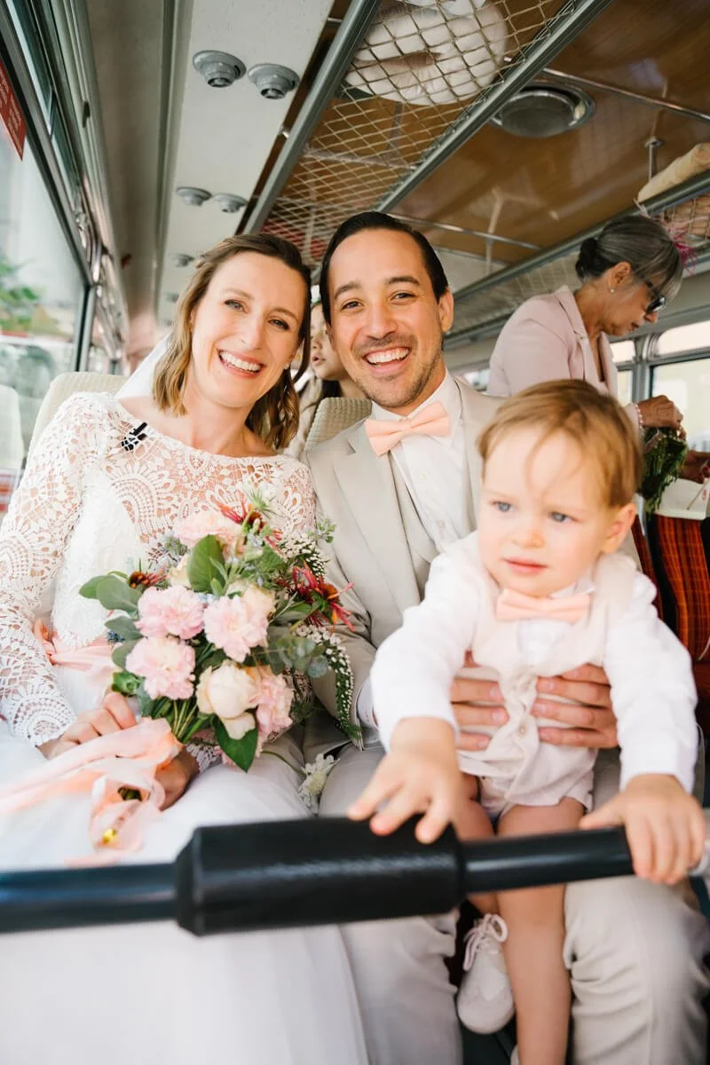 Wedding couple in retro school bus during their wedding celebration. Rental Munich