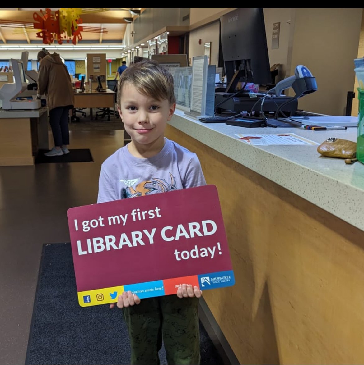Auggie gets his library card in March