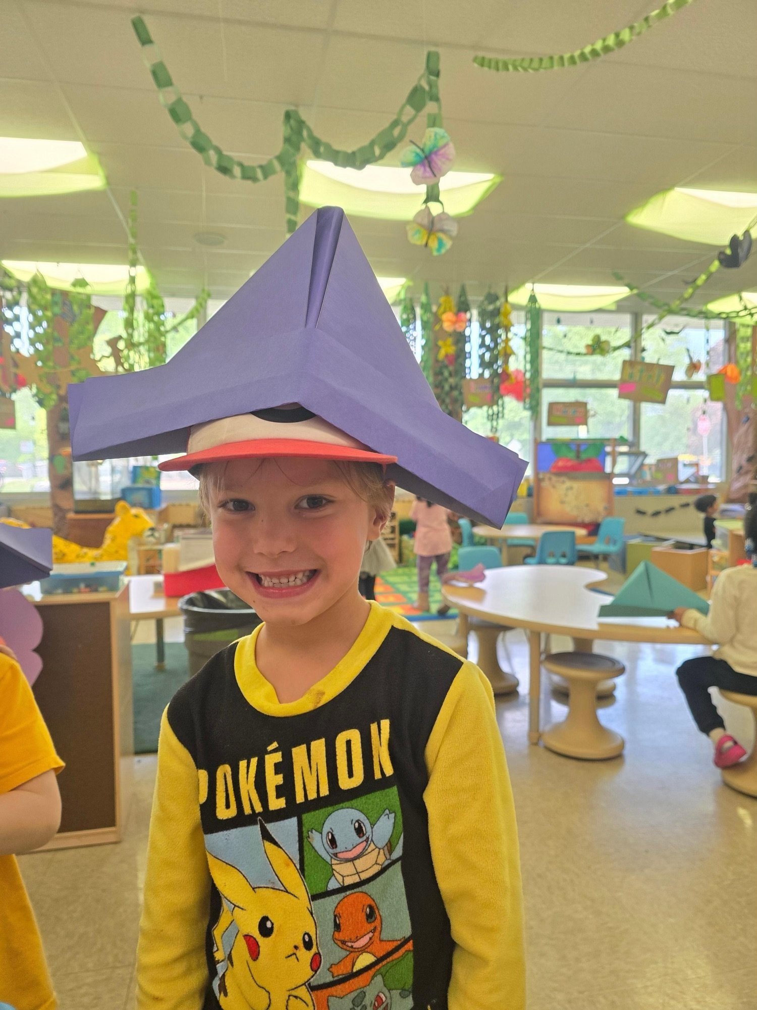 Auggie wears a funny hat in May