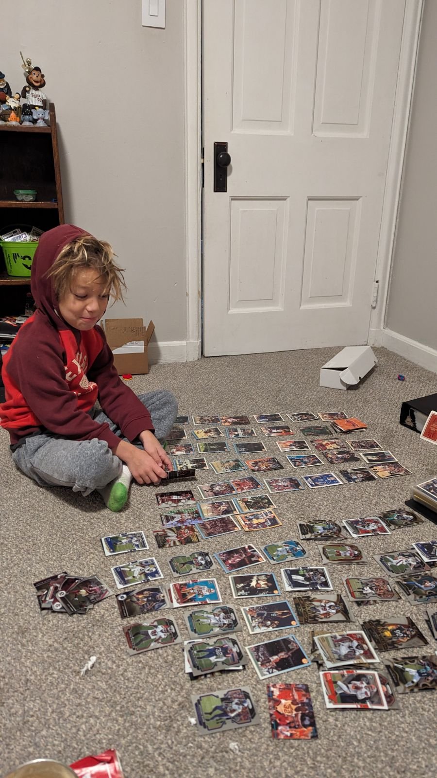 Auggie has tons of Pokemon cards
