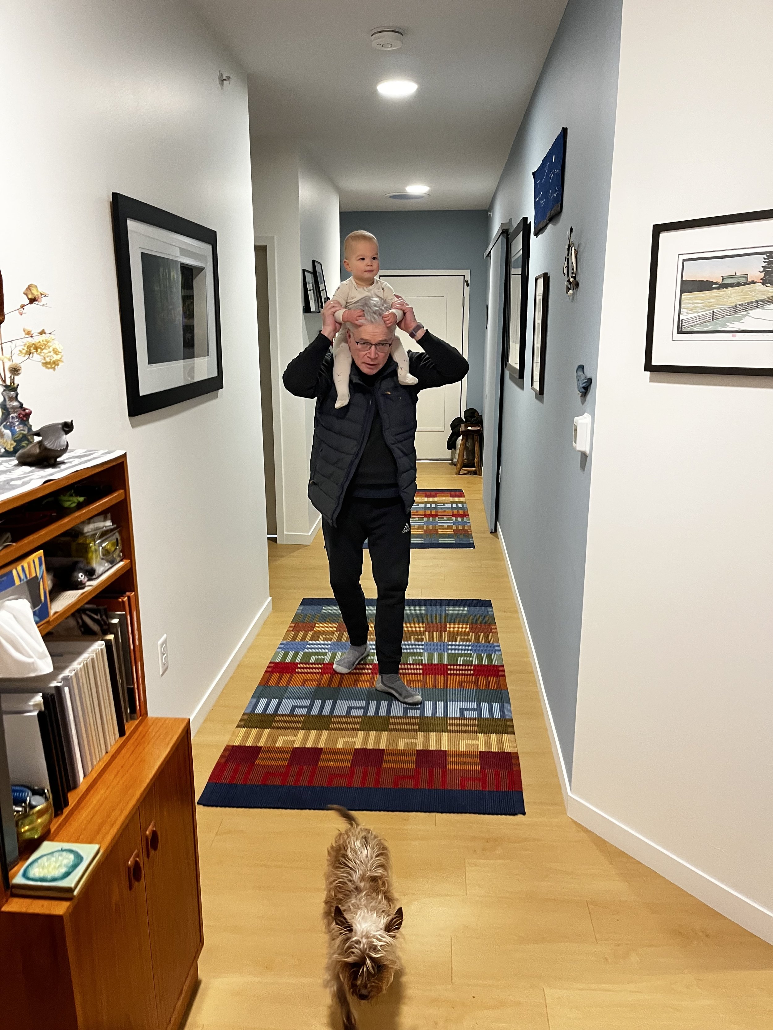 Altai getting a tour of his grandparents' pad