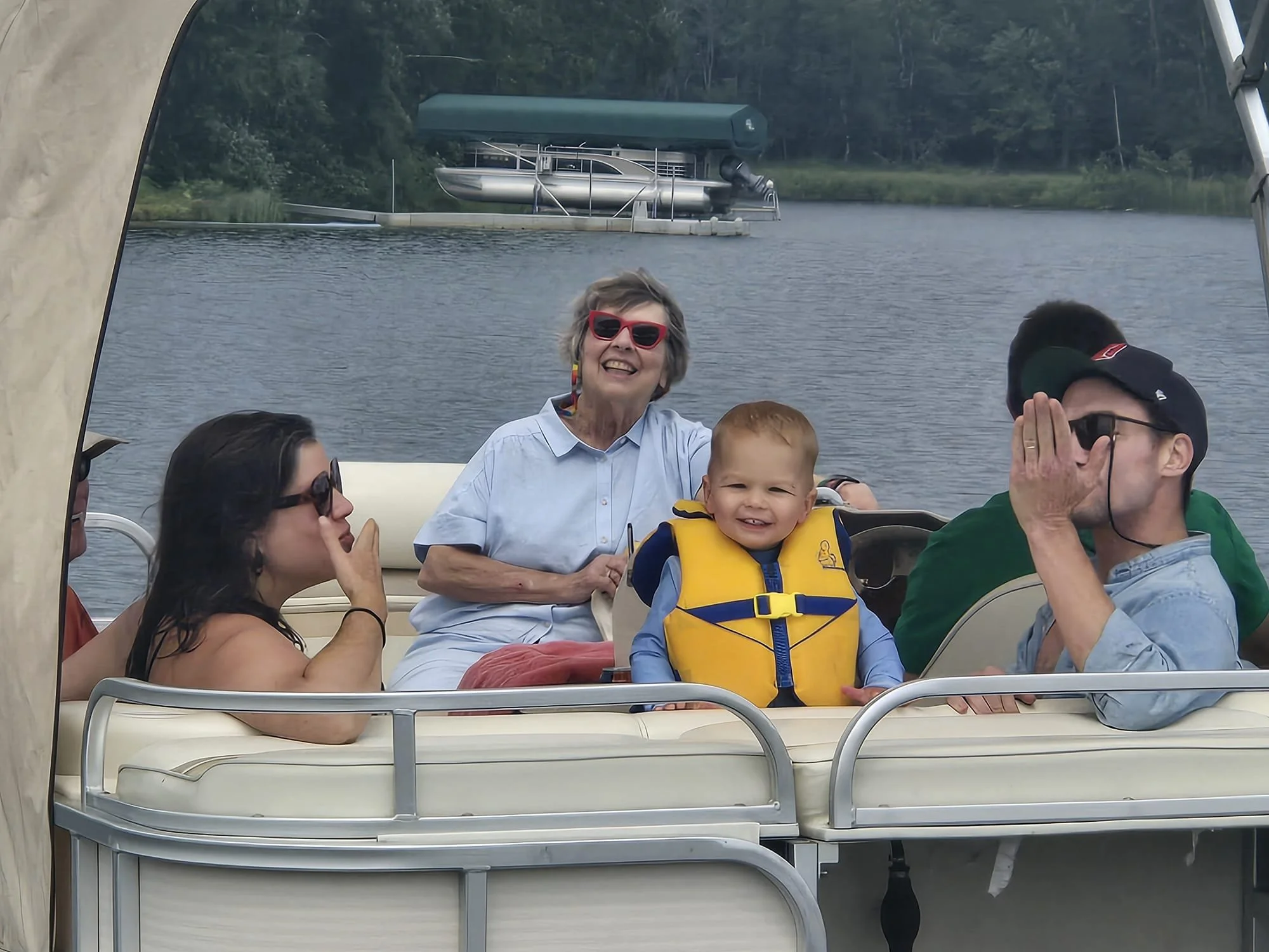 Kristy and kids on pontoon.jpg