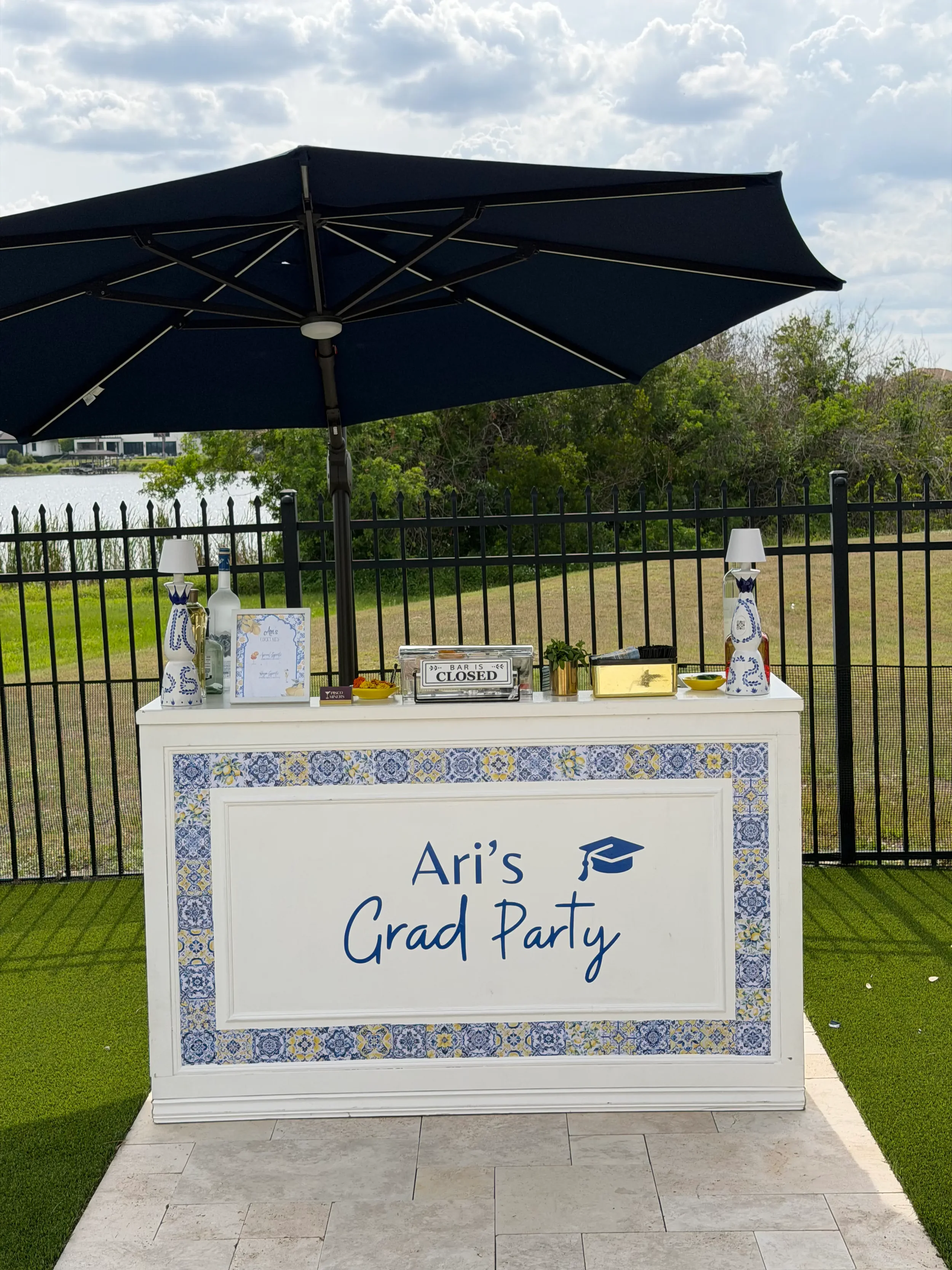 Custom mobile bar styled with an Amalfi Coast theme, featuring signature cocktails and elegant décor for a private celebration in Orlando.
