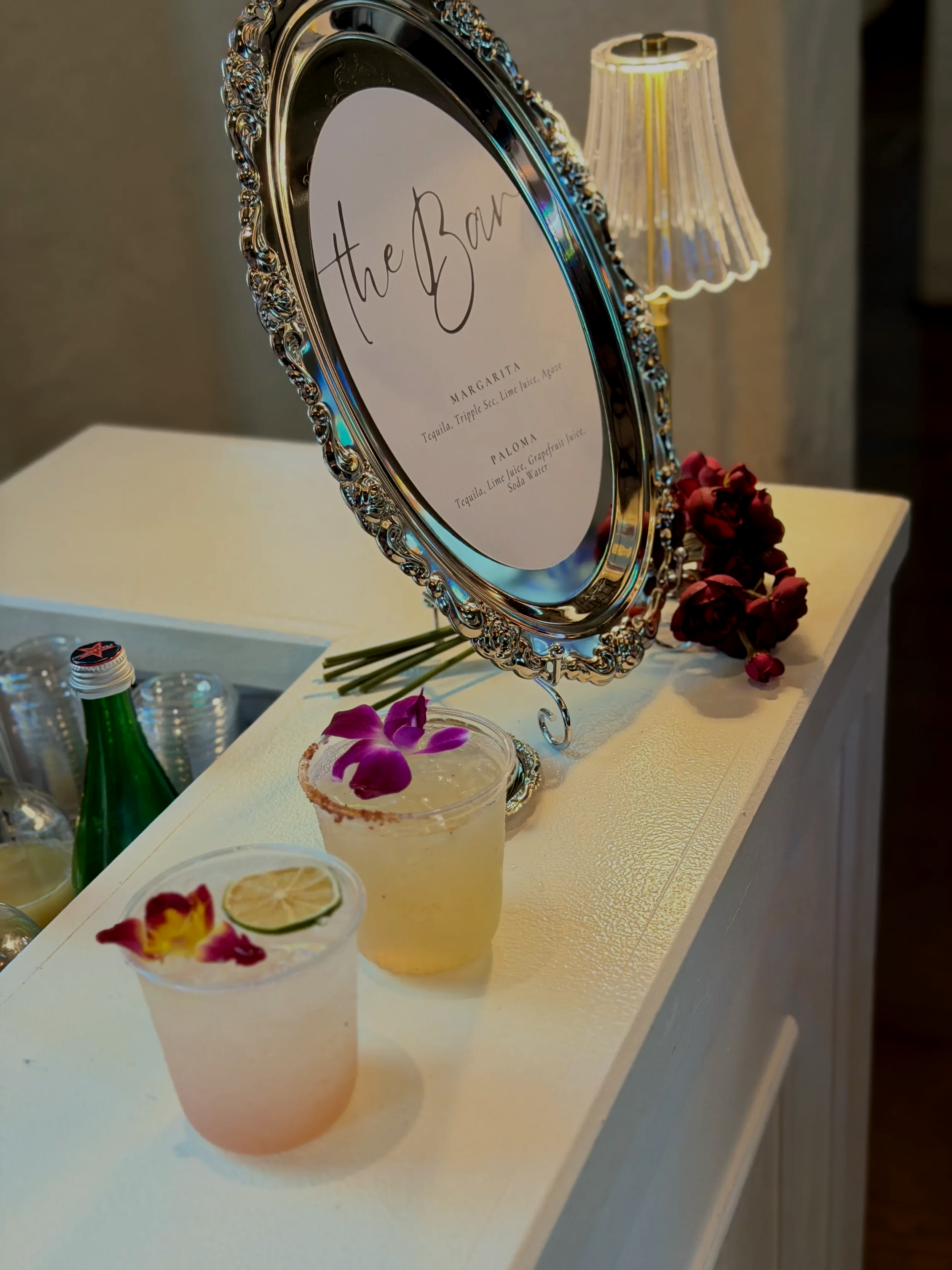 Custom wedding drink menu and signature cocktails displayed at a luxury Orlando wedding, styled by Pisco Mixers as part of an elegant mobile bar experience.