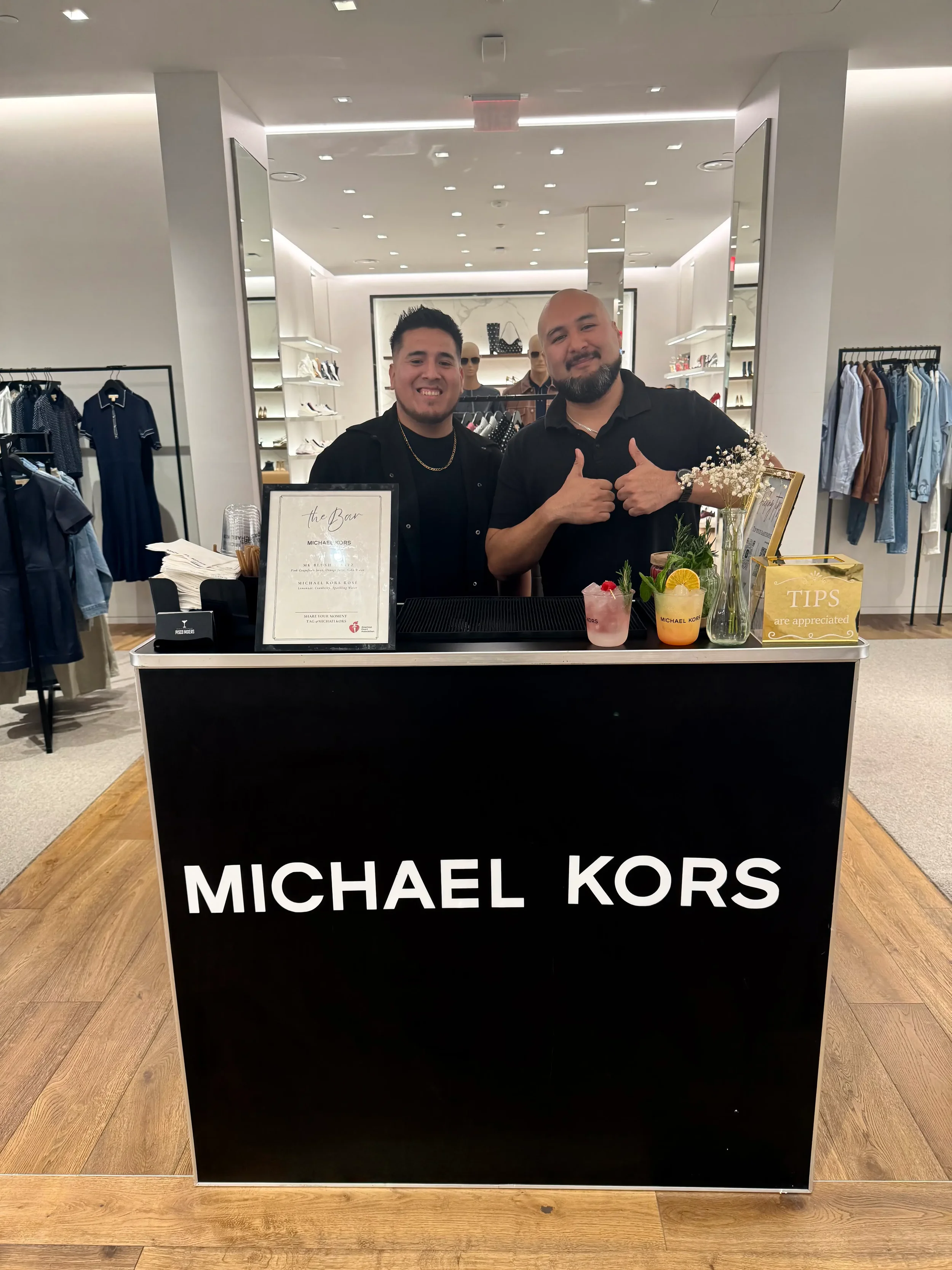 Luxury mobile bar setup by Pisco Mixers for a Michael Kors retail brand activation in Miami, showcasing professional bartending, branded presentation, and guest experience.