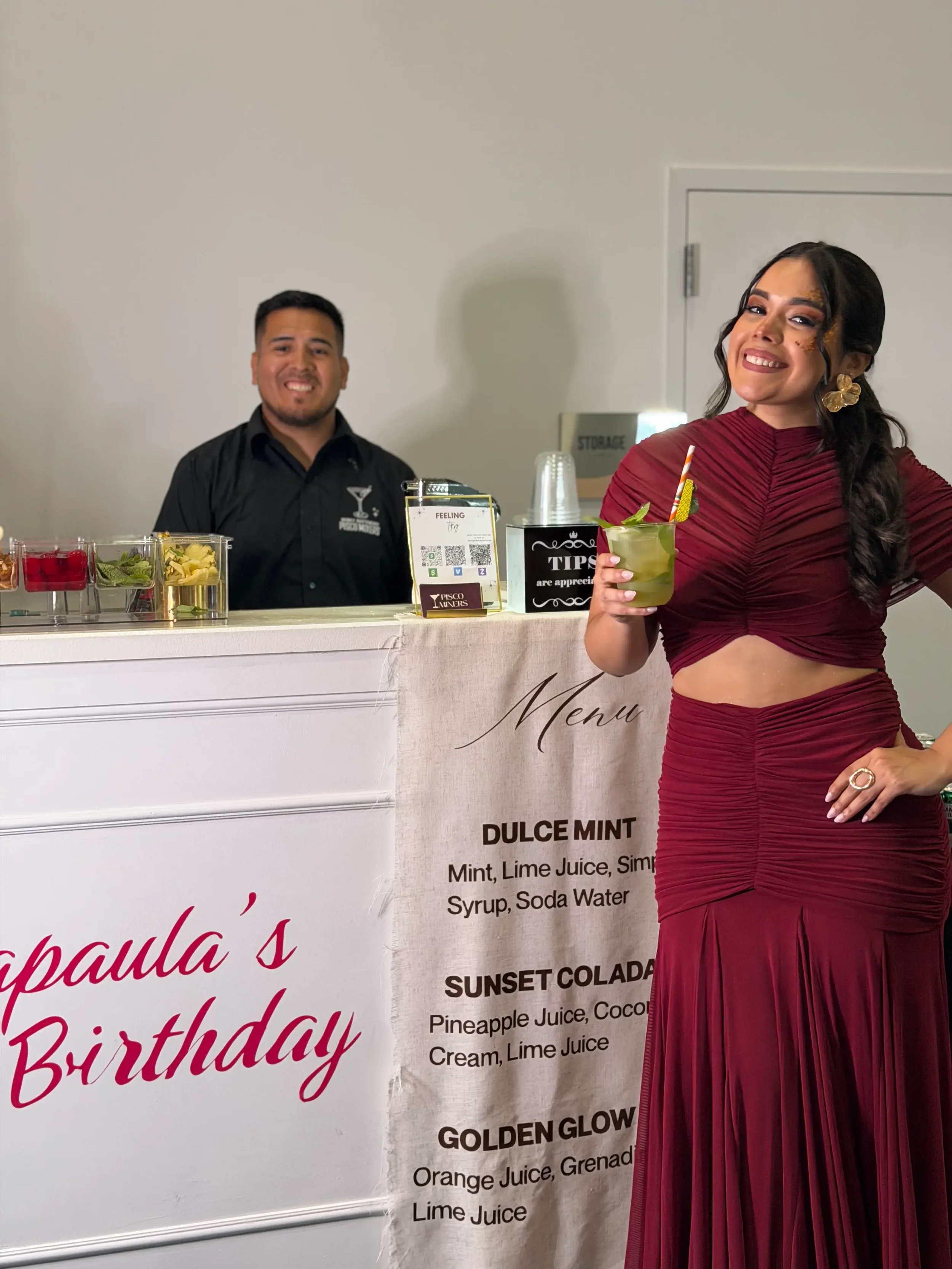 Quinceañera celebrating with a custom mobile mocktail bar alongside the bartender in Orlando, featuring a personalized menu, elegant bar setup, and handcrafted signature drinks.