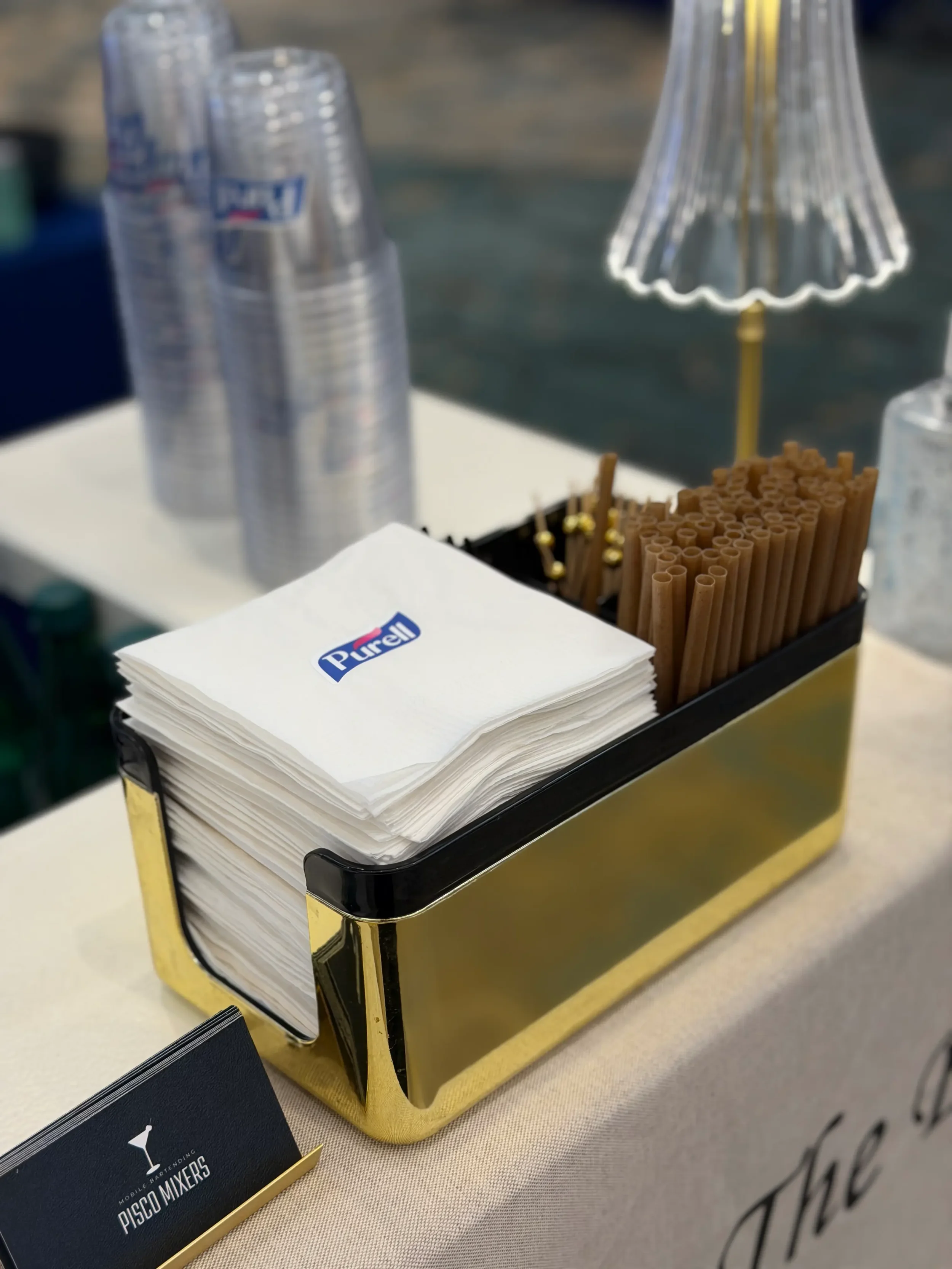 Custom Purell branded cocktail napkins created for a corporate trade show and brand activation, showcasing personalized event branding by Pisco Mixers.