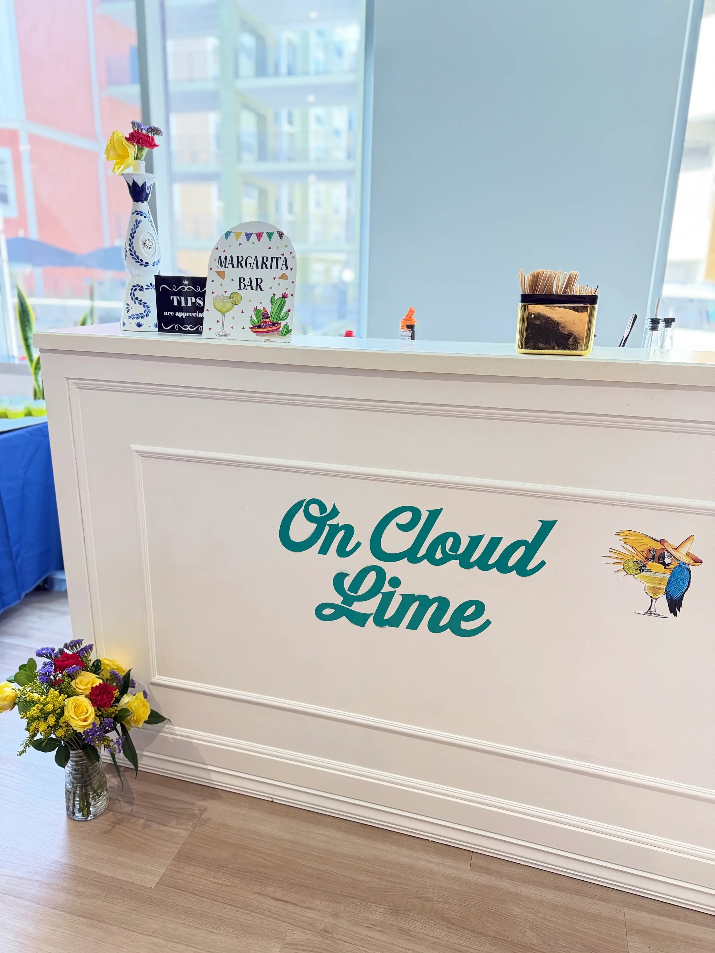Custom mobile mocktail bar from a different angle during an On Cloud 9 corporate lunch break in Orlando, showcasing branded décor, signature margaritas, and a professional event setup.