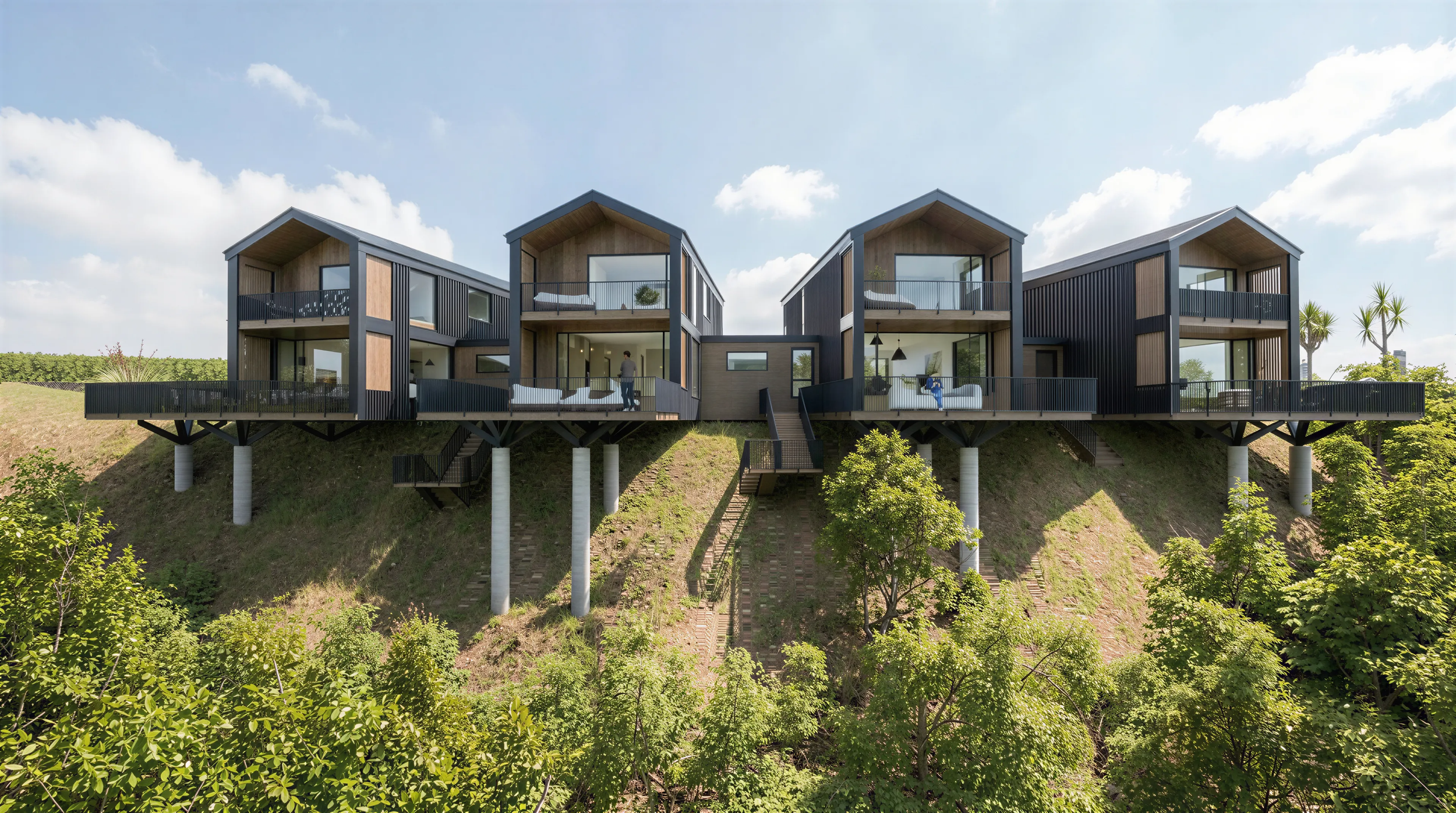 Splayed two storey Passive House inspired townhouses with balconies and mixed cladding, Hamilton medium density development
