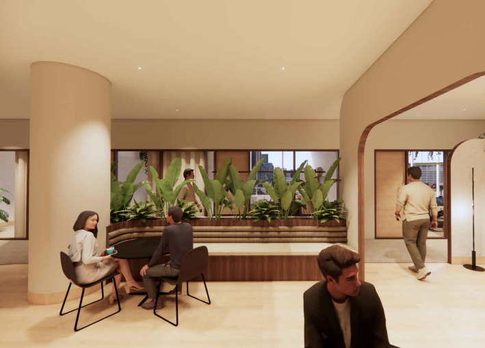 Modern indoor lounge with people sitting and walking near large green plants, neutral-colored walls, and wooden accents.