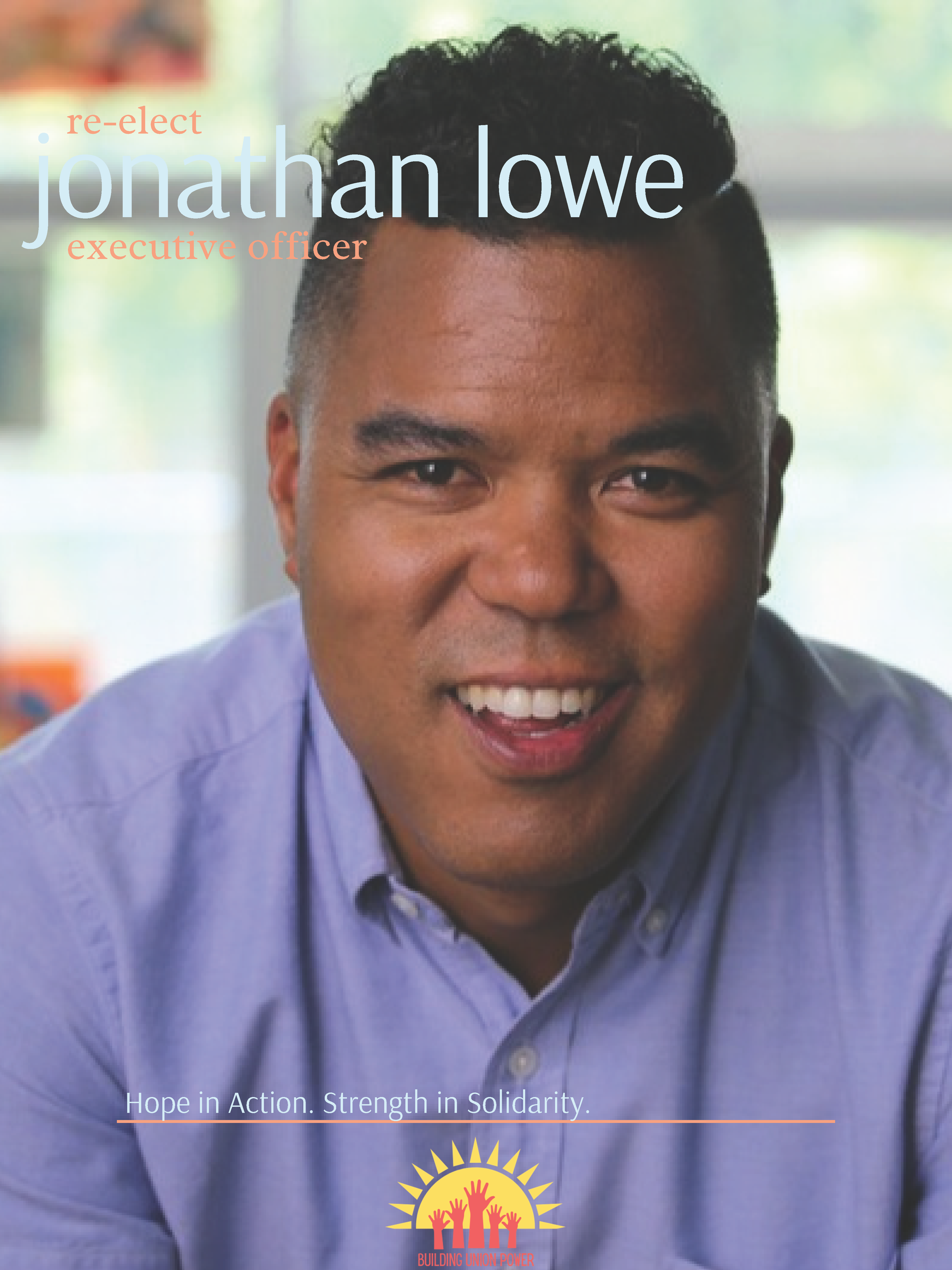 Close-up of Jonathan Lowe smiling, wearing a light purple collared shirt, with campaign text and logo in the background.