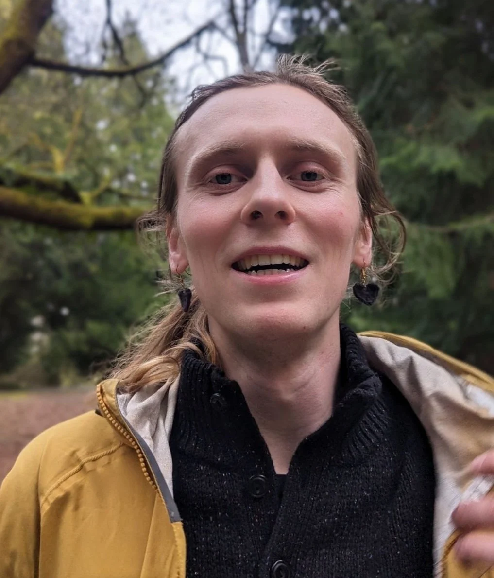 JD smiling into camera