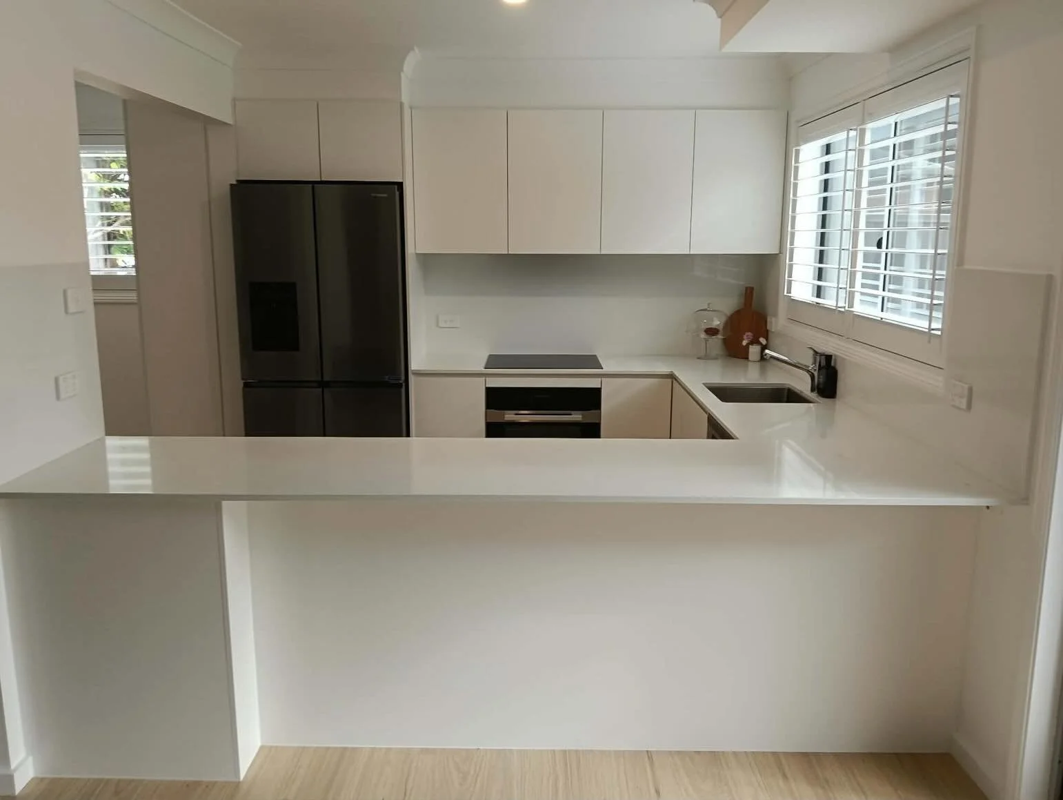 Recent kitchen we finished at Adamstown! Super modern, super fresh, and timeless. Our client decided to upgrade to a matching stone splash back as well which turned out great!