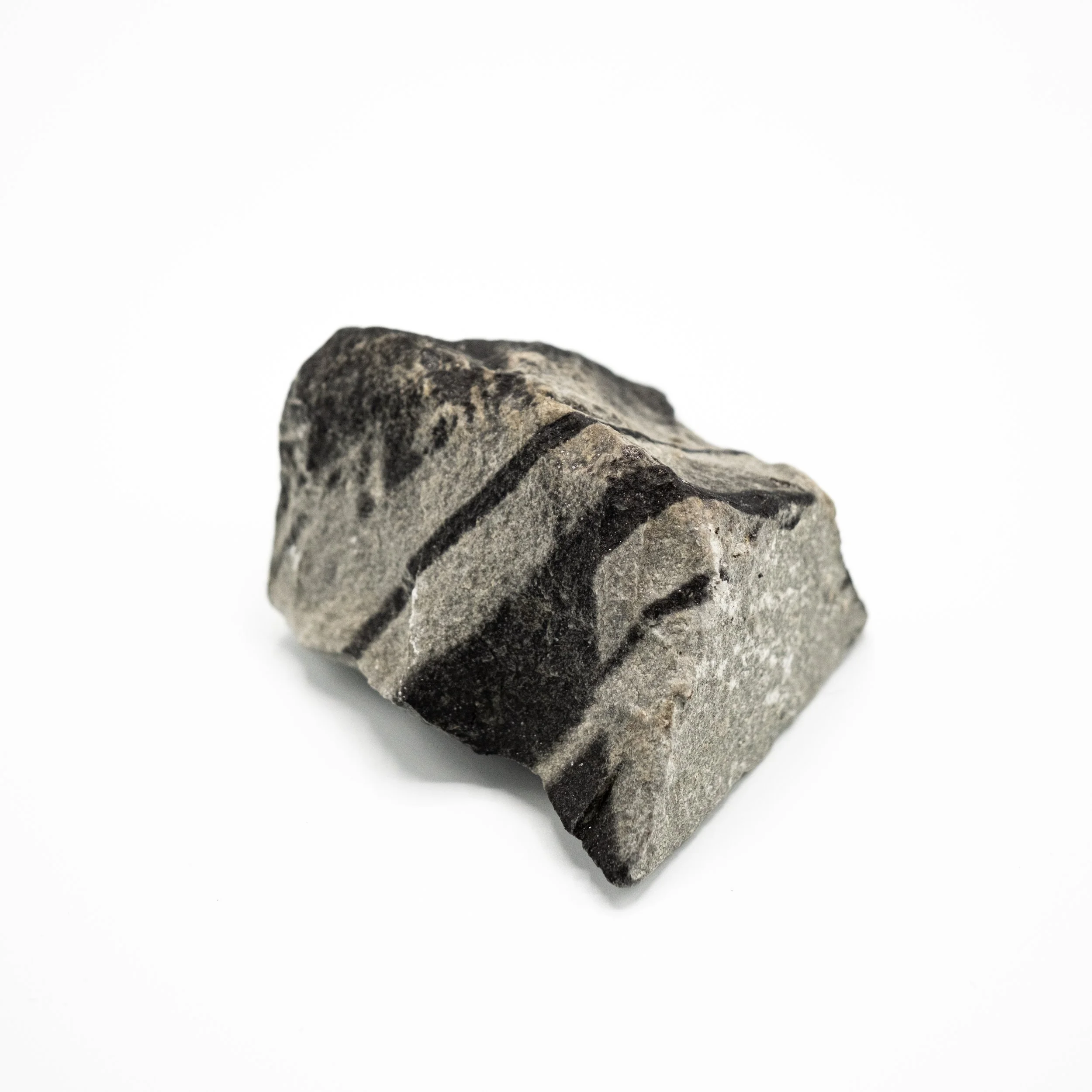 THE PAST TENSE | Silver gelatin on sandstone fragment |Ca. 8 x 7 x 4cm | Unique piece | 50€