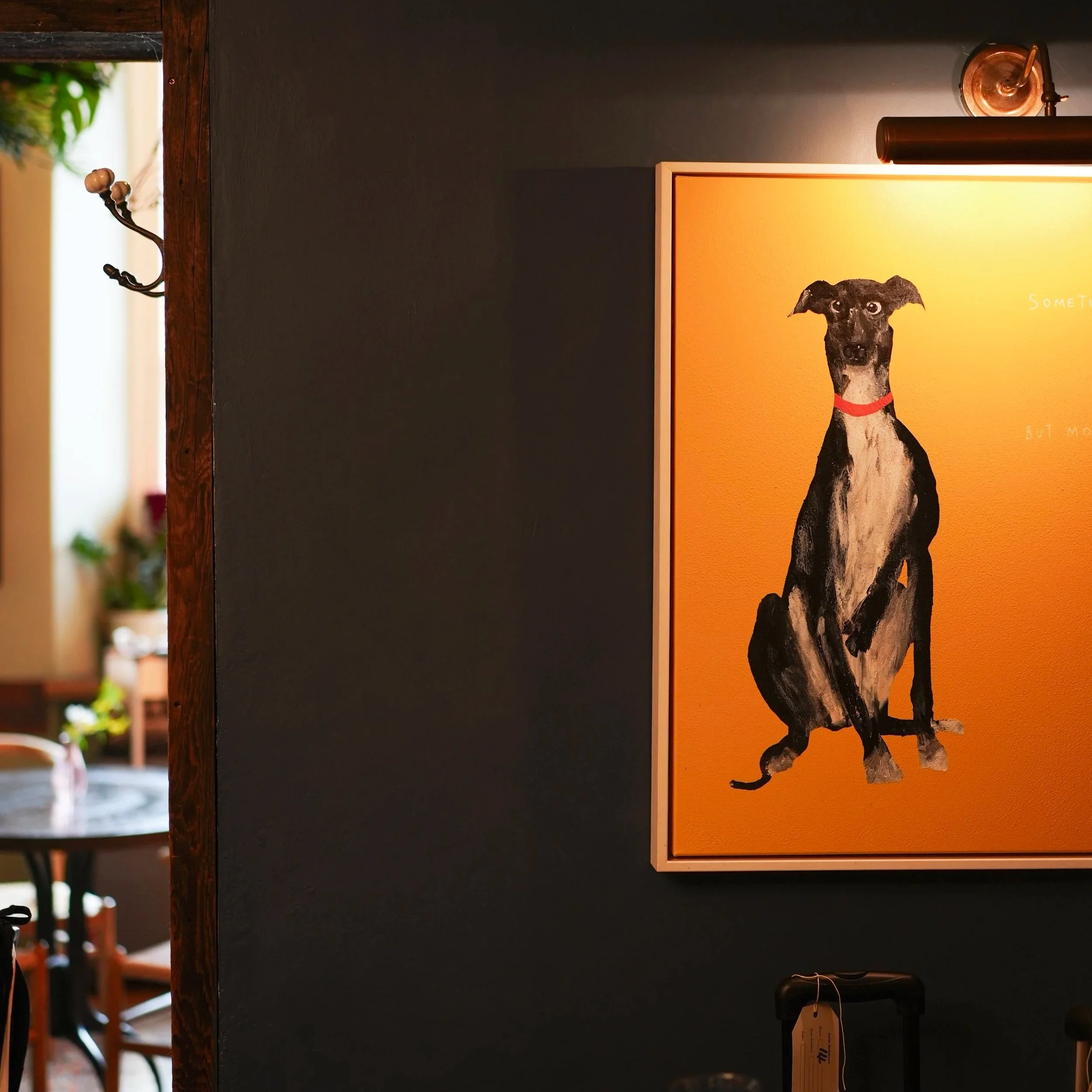 Artist Residence Penzance details - moody walls, warm artwork and playful character around every corner, bringing a little personality to the Cornish stay.