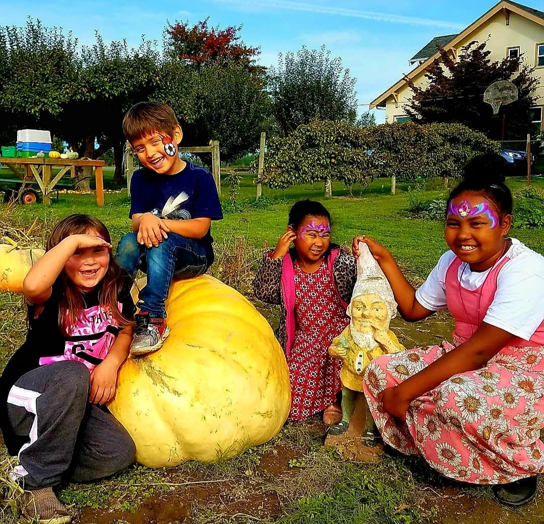 Children with Pumpkin and Gnome.jpg