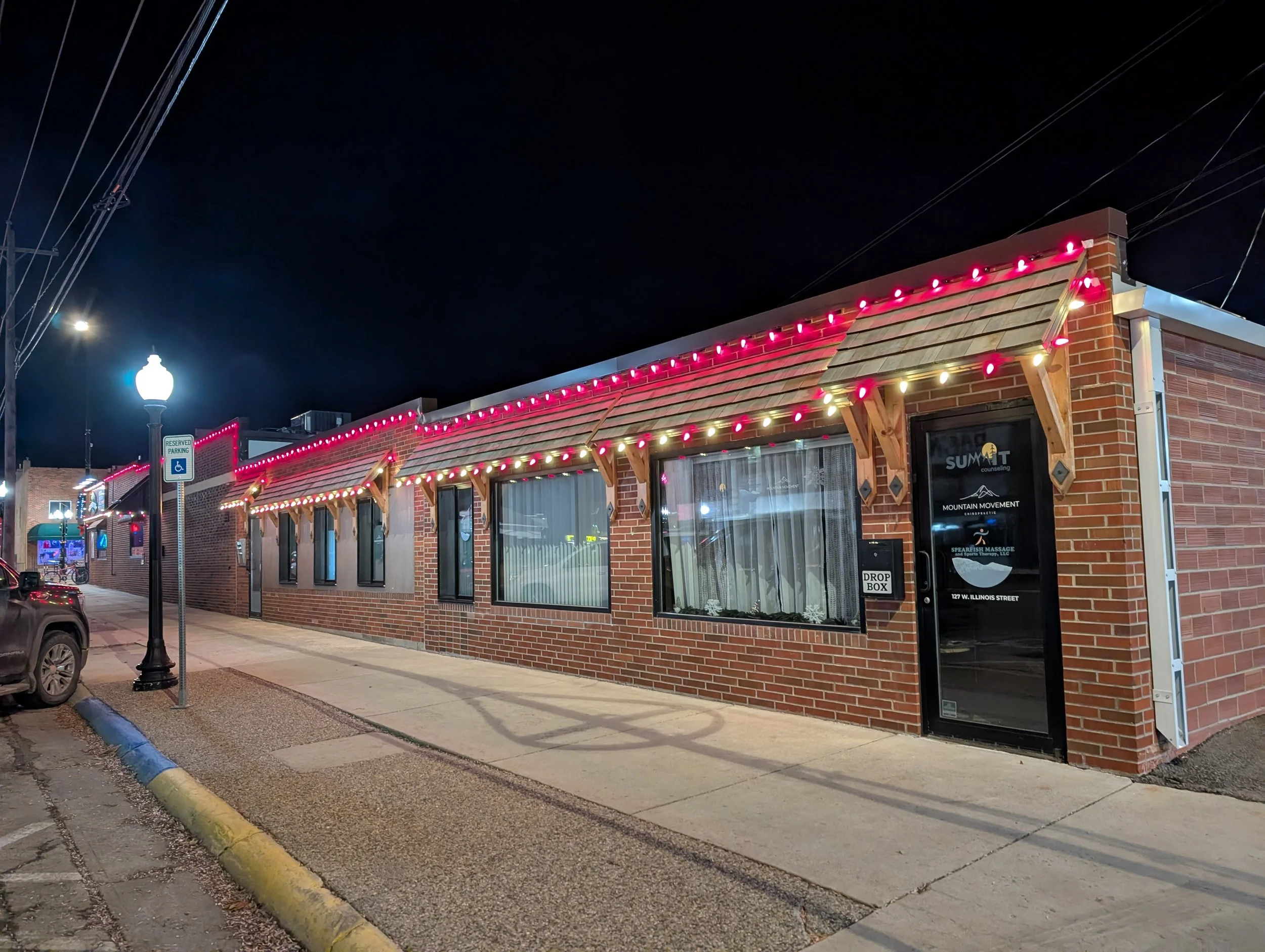 Mountain Movement Chiropractic with lights on building