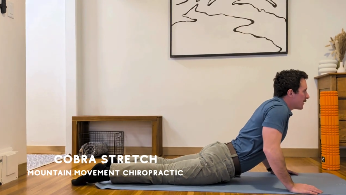 Dr. Hansen demonstrating a low back cobra stretch