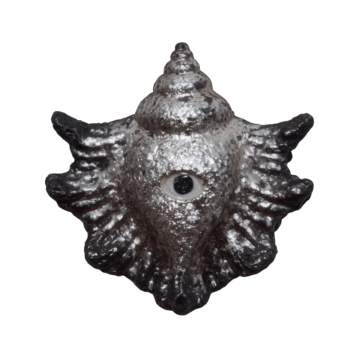 A metallic sculpture of a sea creature with a single eye in the center of its face, featuring a textured, spiked surface and a conical shell on top.