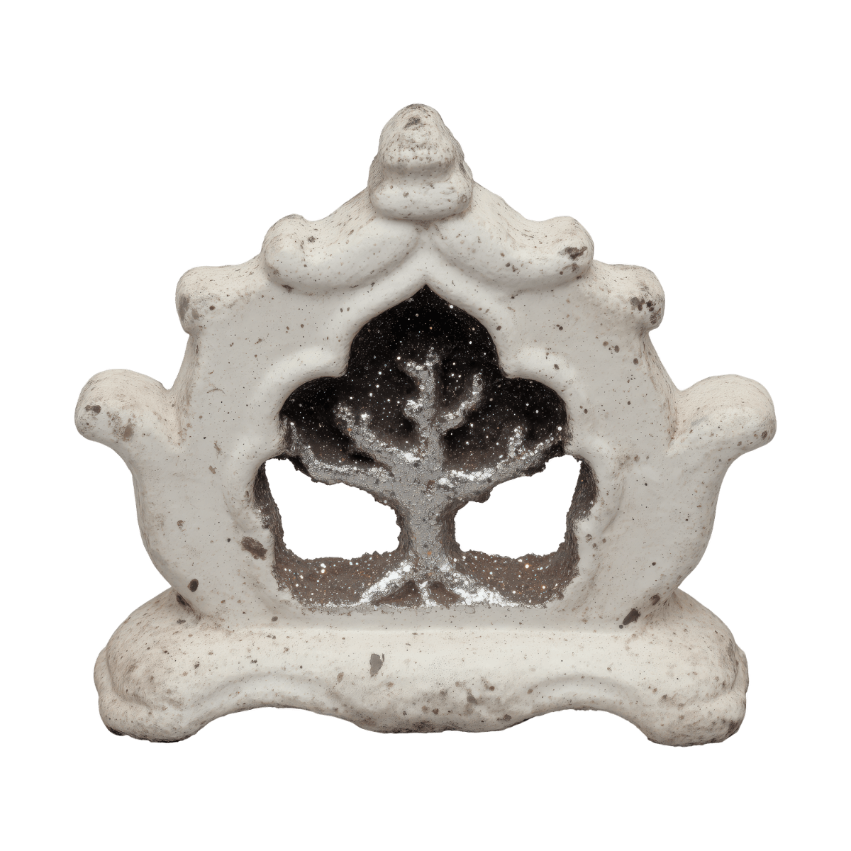 Decorative white ceramic or plaster house-shaped ornament with a cutout tree inside, set against a black background.