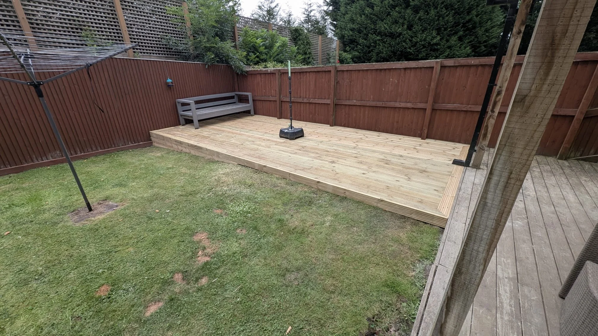 Garden decking boards with Cuprinol-style timber stain finish