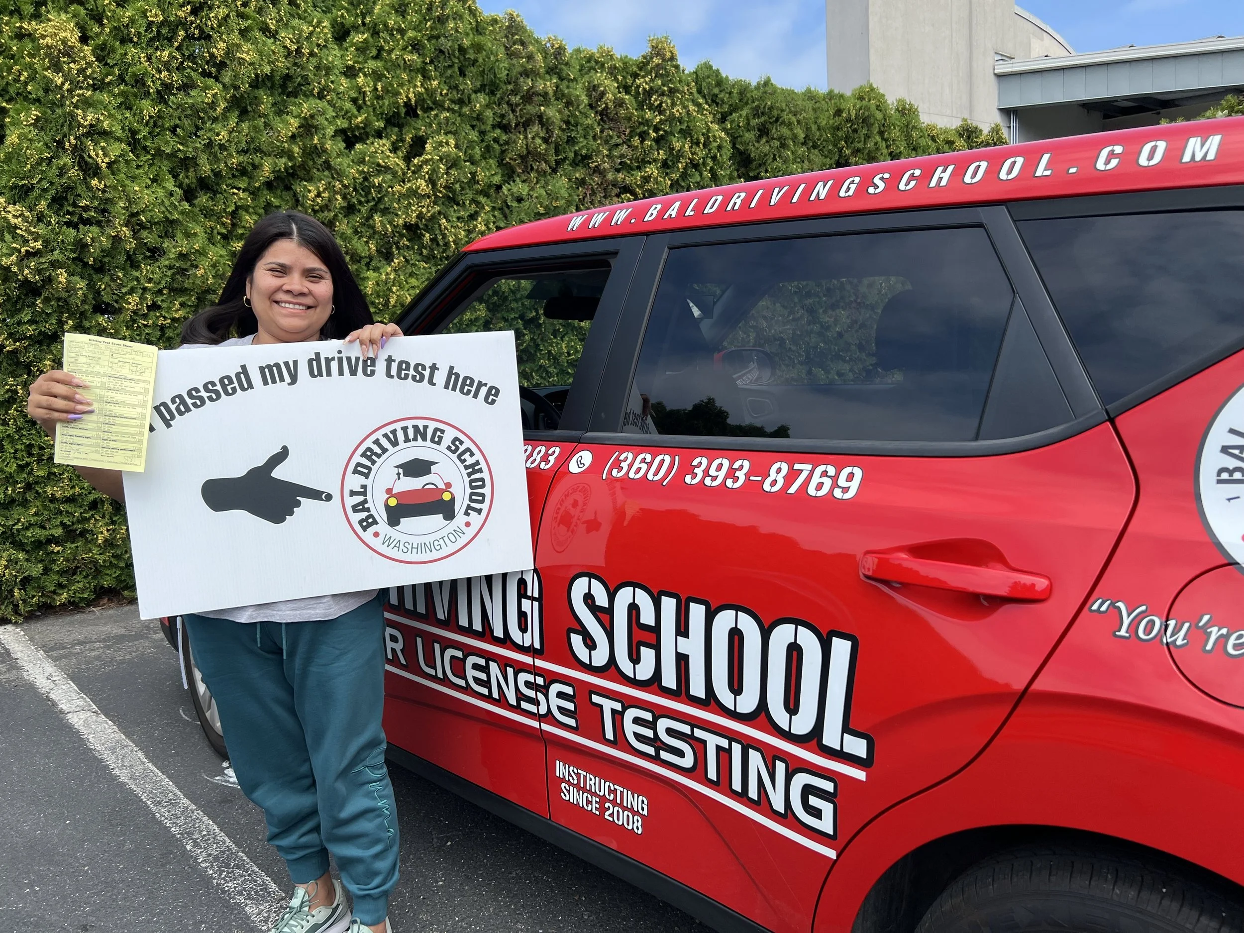 Beginner practicing behind the wheel during adult driving lessons near me in Washington