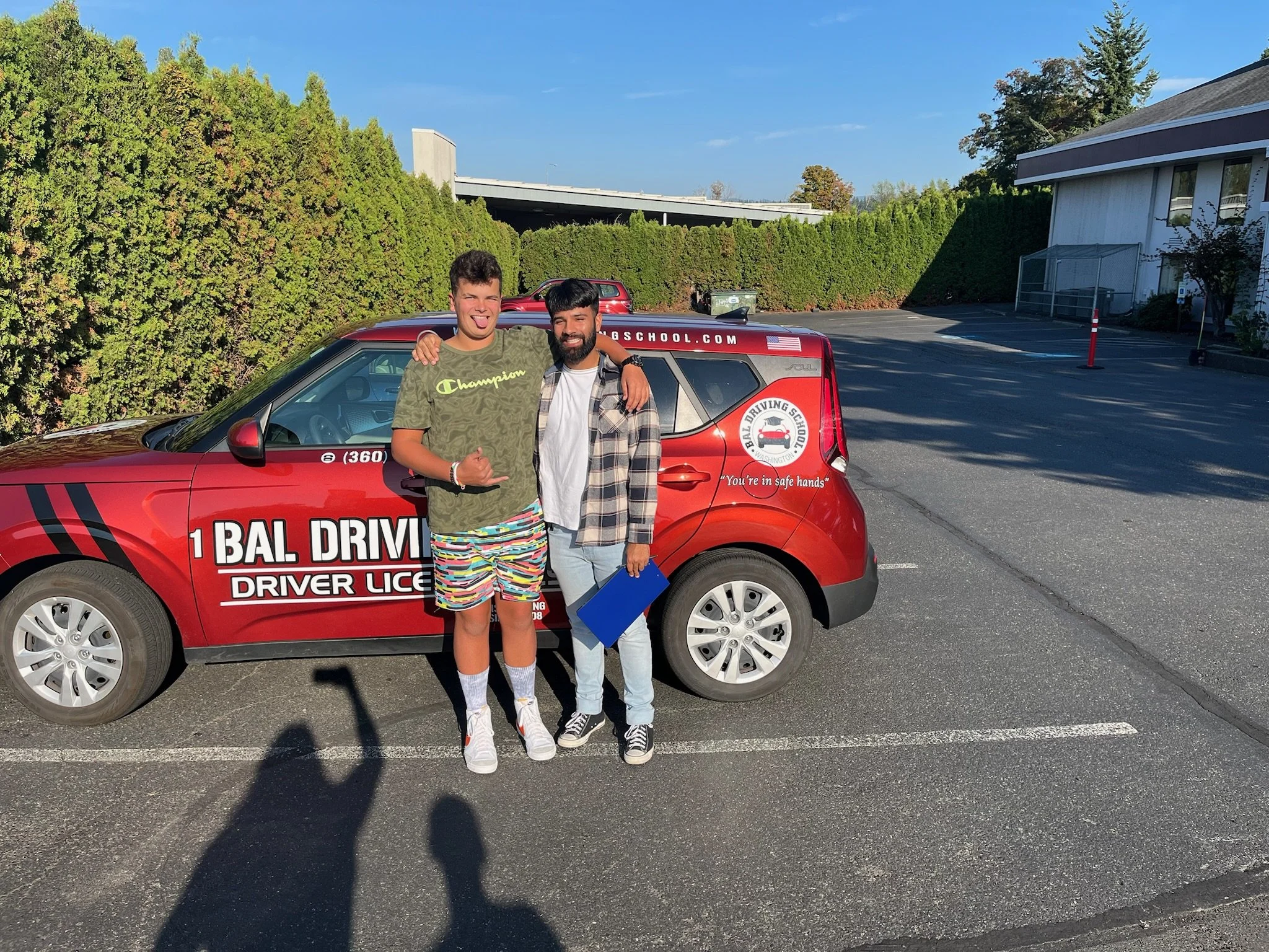 Student taking a lesson at a driving school near me in Lynnwood, WA with a professional driving instructor