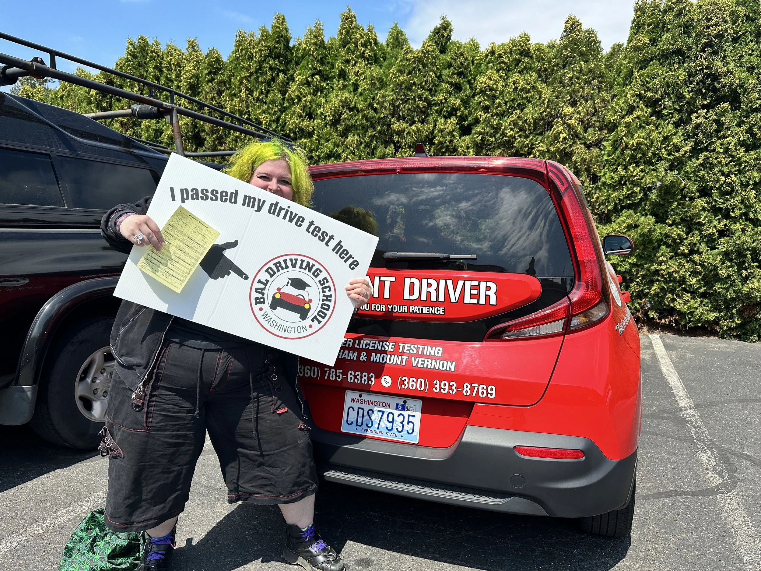 Driver practicing traffic awareness during defensive driving lessons near me in Lynnwood, WA