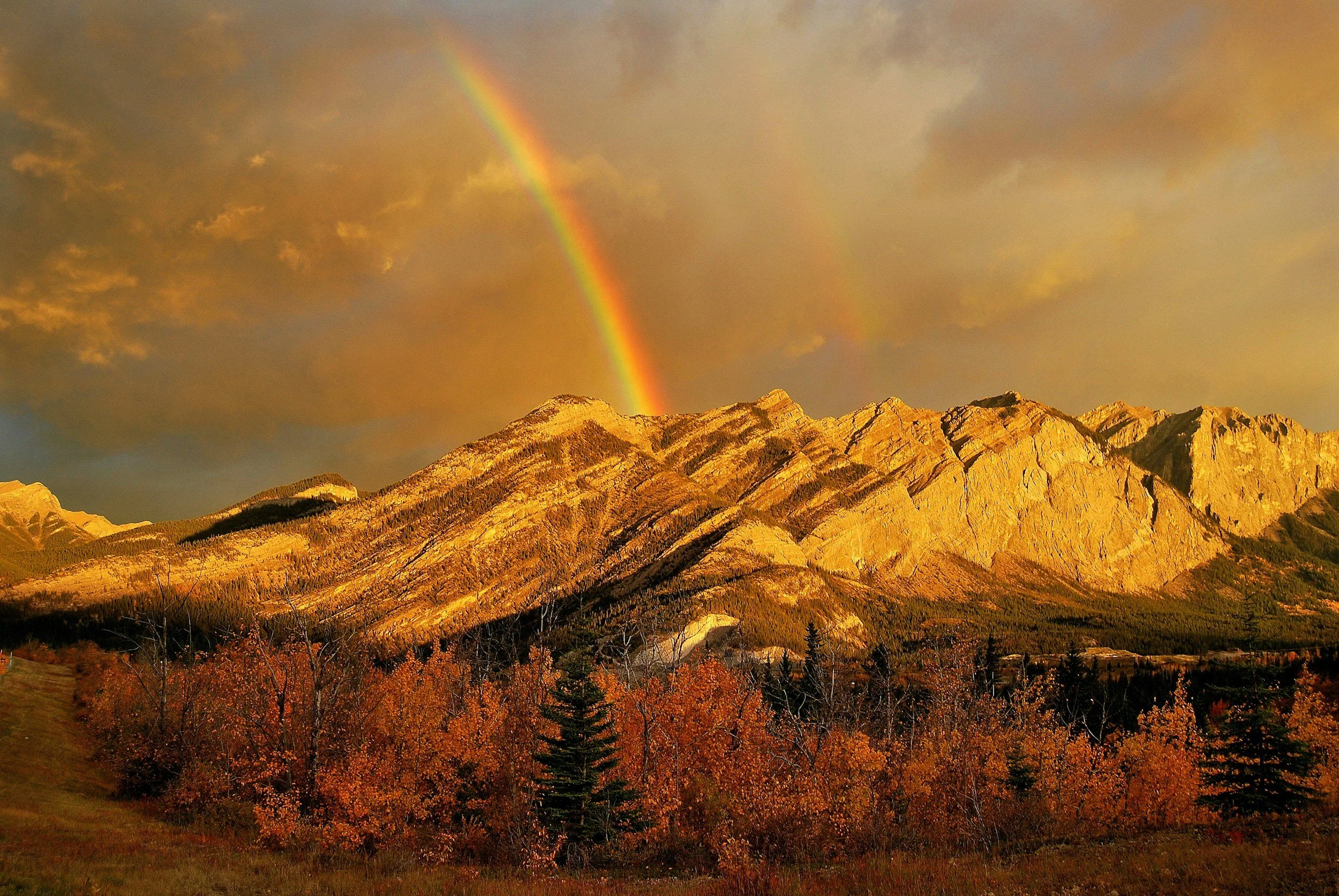 Mountain with rainbow. Grief counseling Longmont, CO. Trauma therapist Longmont, CO.