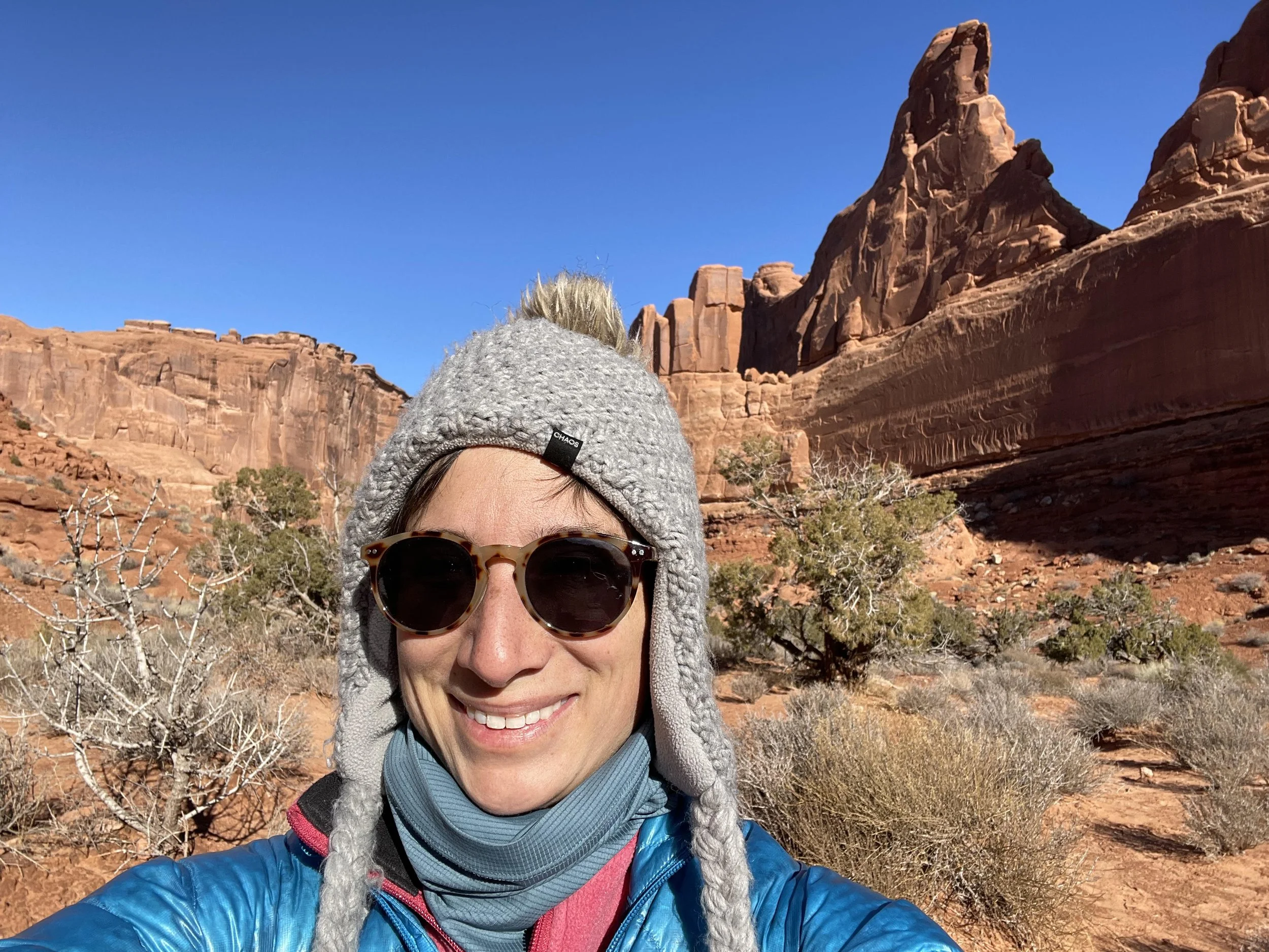 Sophia in front of red rock canyon in Utah.  Trauma therapy Longmont, CO