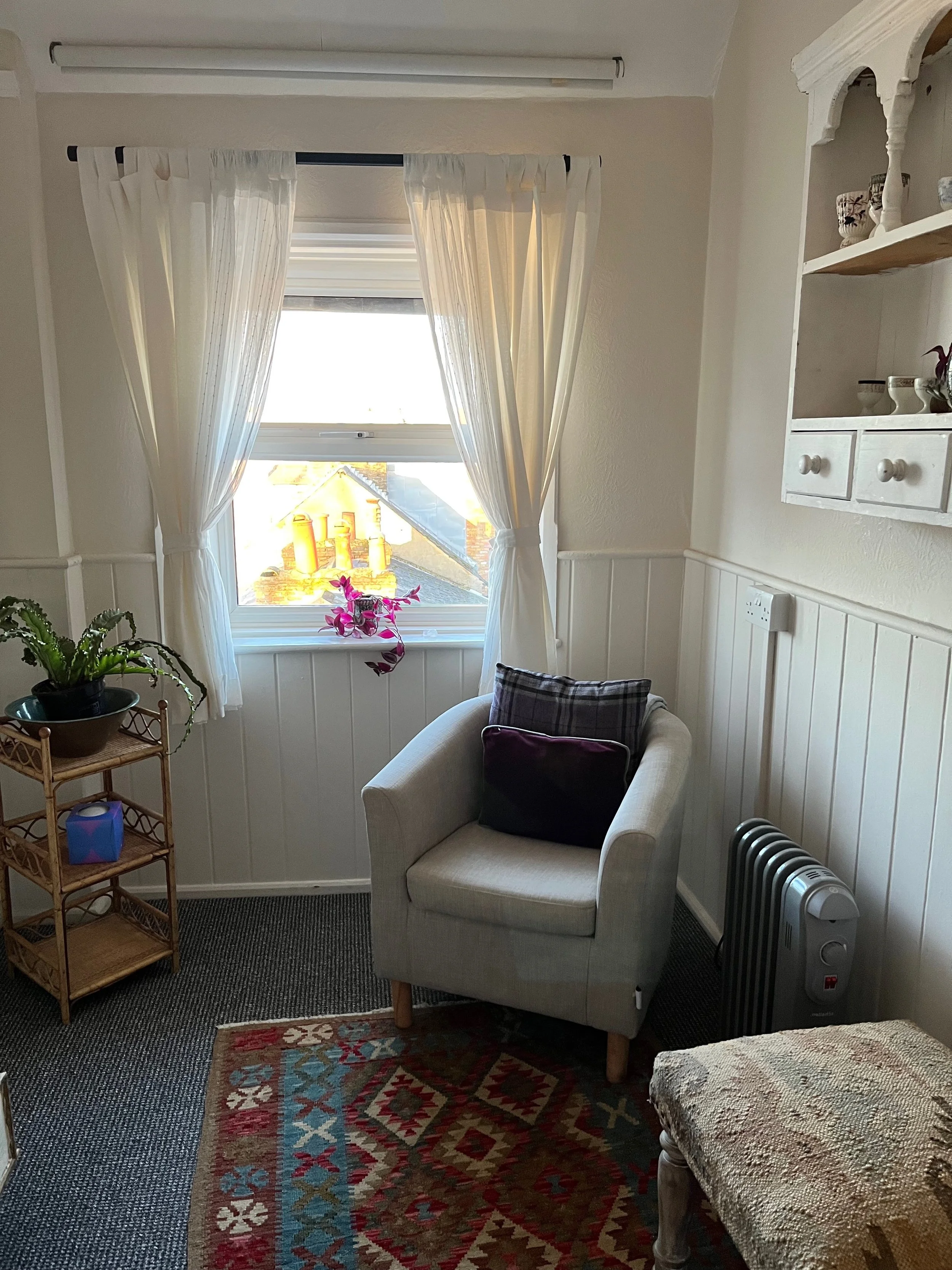 Counselling room in Twickenham where I offer face-to-face therapy sessions.