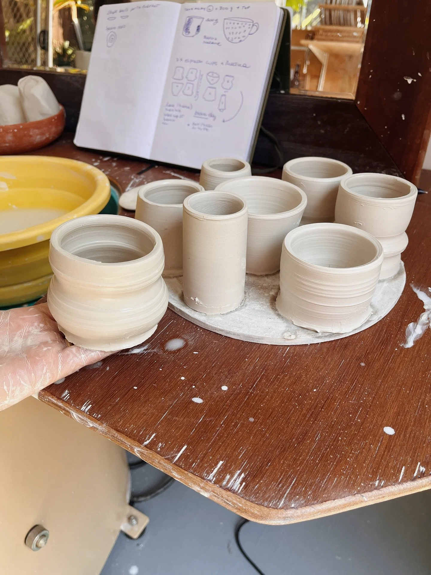 Espresso, anyone?
My sister wants espresso cups. she said I could make them how I wanted as long as they had a touch of red in each. 
Today here in Brisbane was so hot that I managed to throw and trim in one day and now I  have an army of little cups