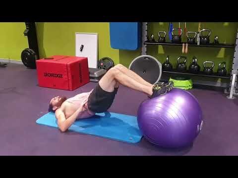 SWISS BALL DOUBLE LEG HIP RAISES