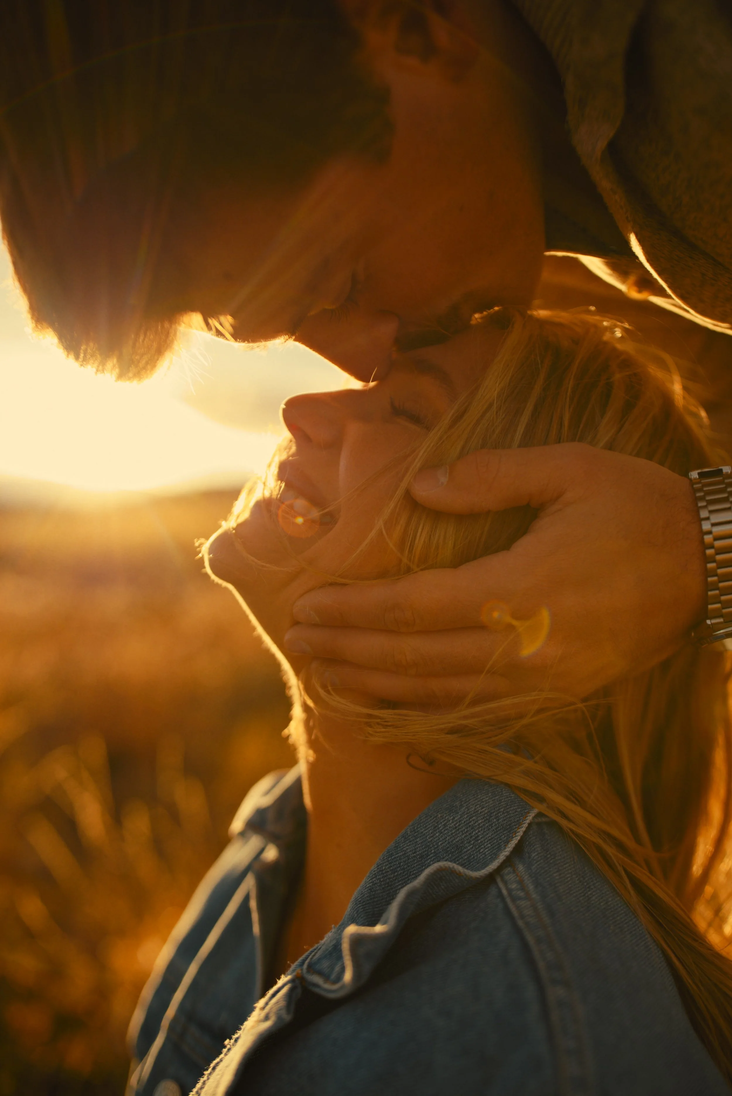 Documentary-style engagement photos in Colorado mountains with authentic emotion