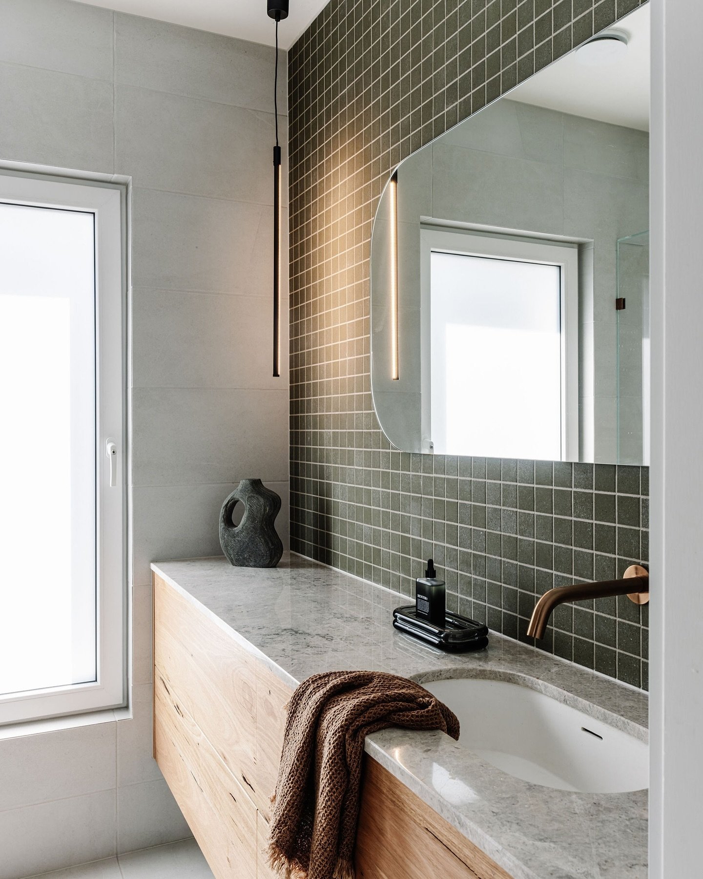 Each of our bathrooms and our kitchen used different materials. We created consistency in the spaces by repeating the use of square tiles and timber throughout our home. Do you think it worked? 

#bathroominspo #bathroomideas #bathrooms #kitchen #kit