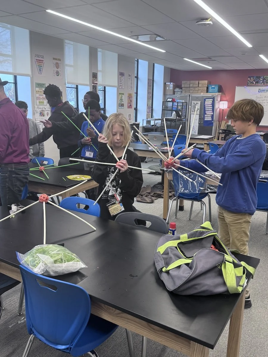 students building pentagons for the biodome