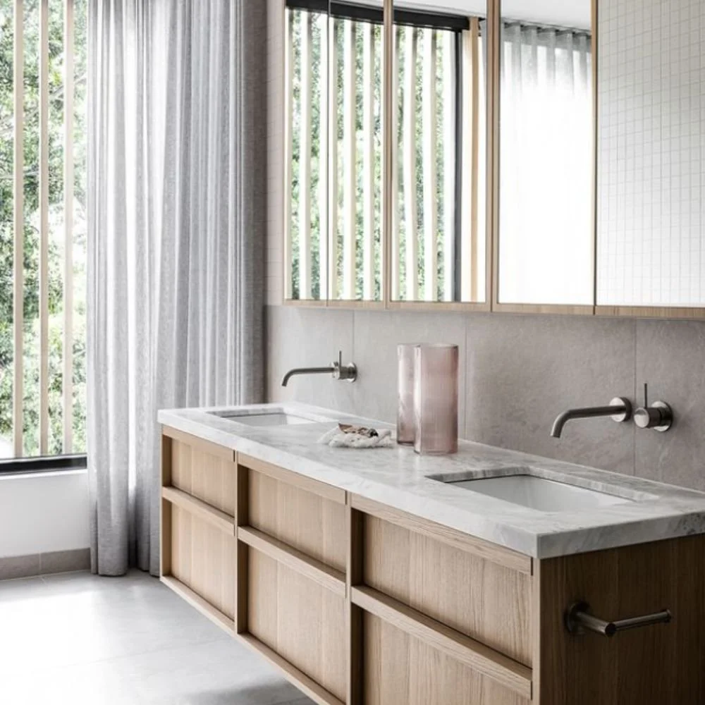 Compact bathroom renovation in North Perth designed with space-saving vanity, efficient layout and contemporary fittings.