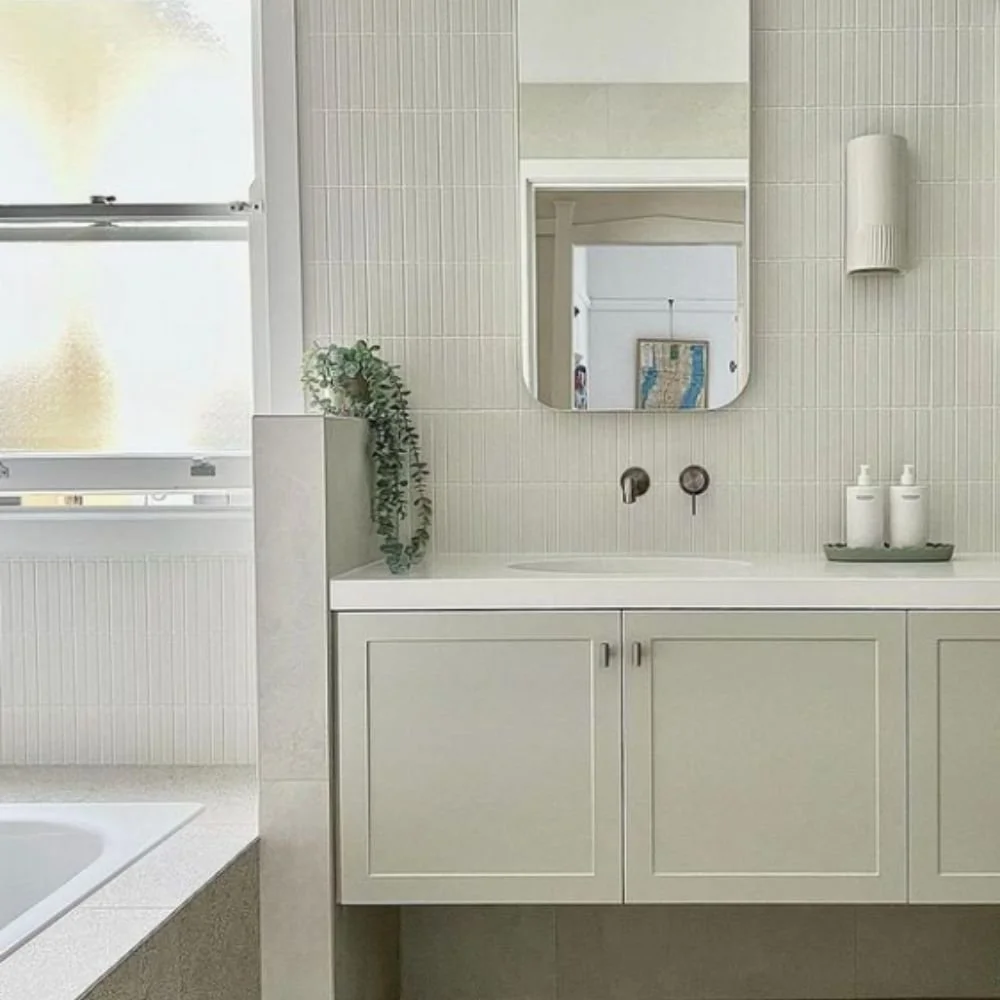 Fully renovated bathroom in North Perth featuring contemporary tiling, walk-in shower, modern vanity and premium fixtures.