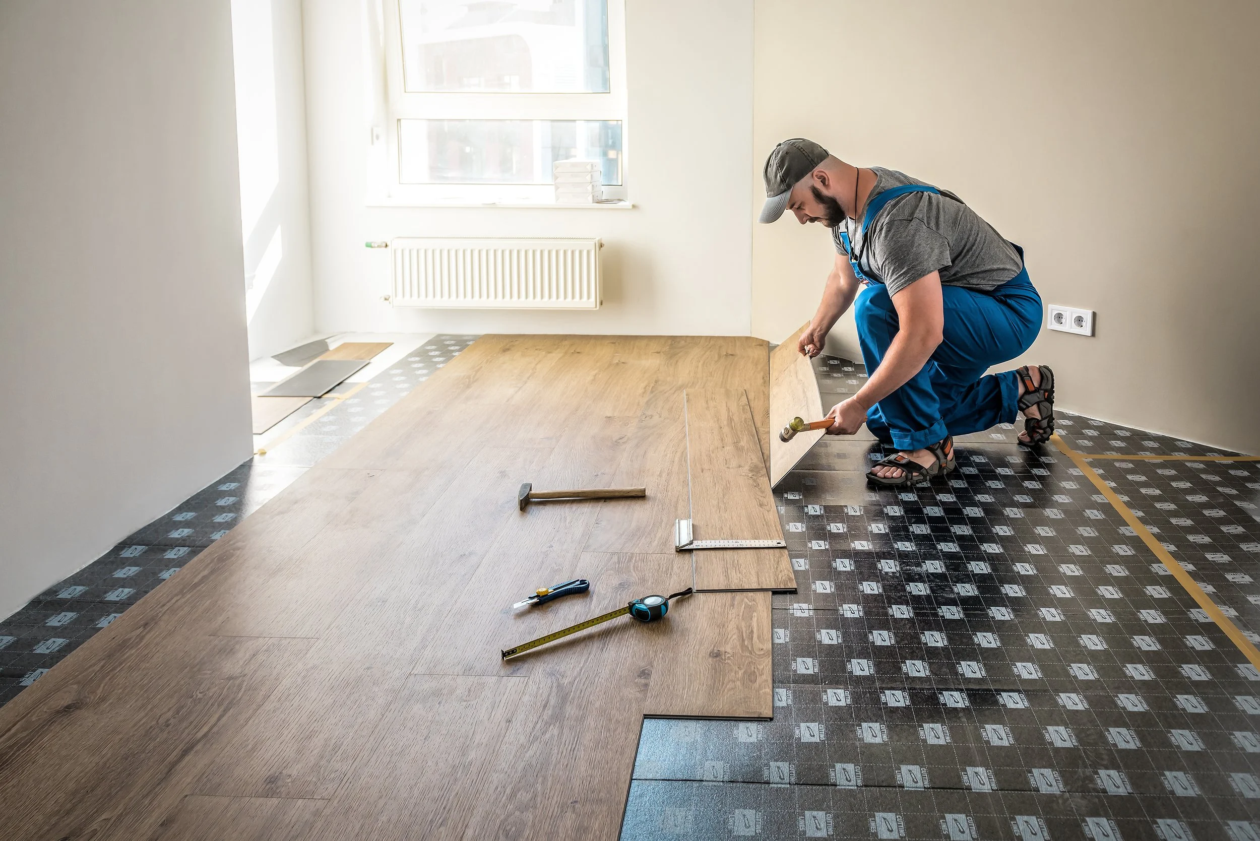 Does AC Remodeling Handle Flooring Installation in Large Renovations? Here’s Why Bundling Saves You Time and Money